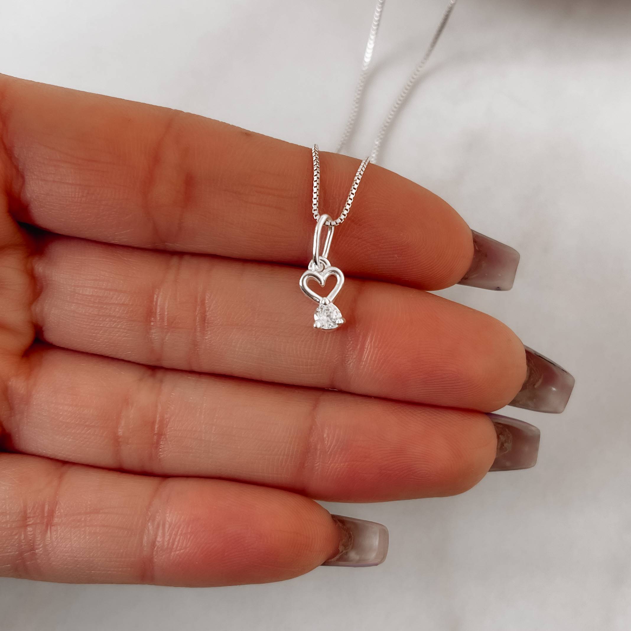 Imagem Secundária Colar pingente coração vazado e zircônia 9mm 40cm