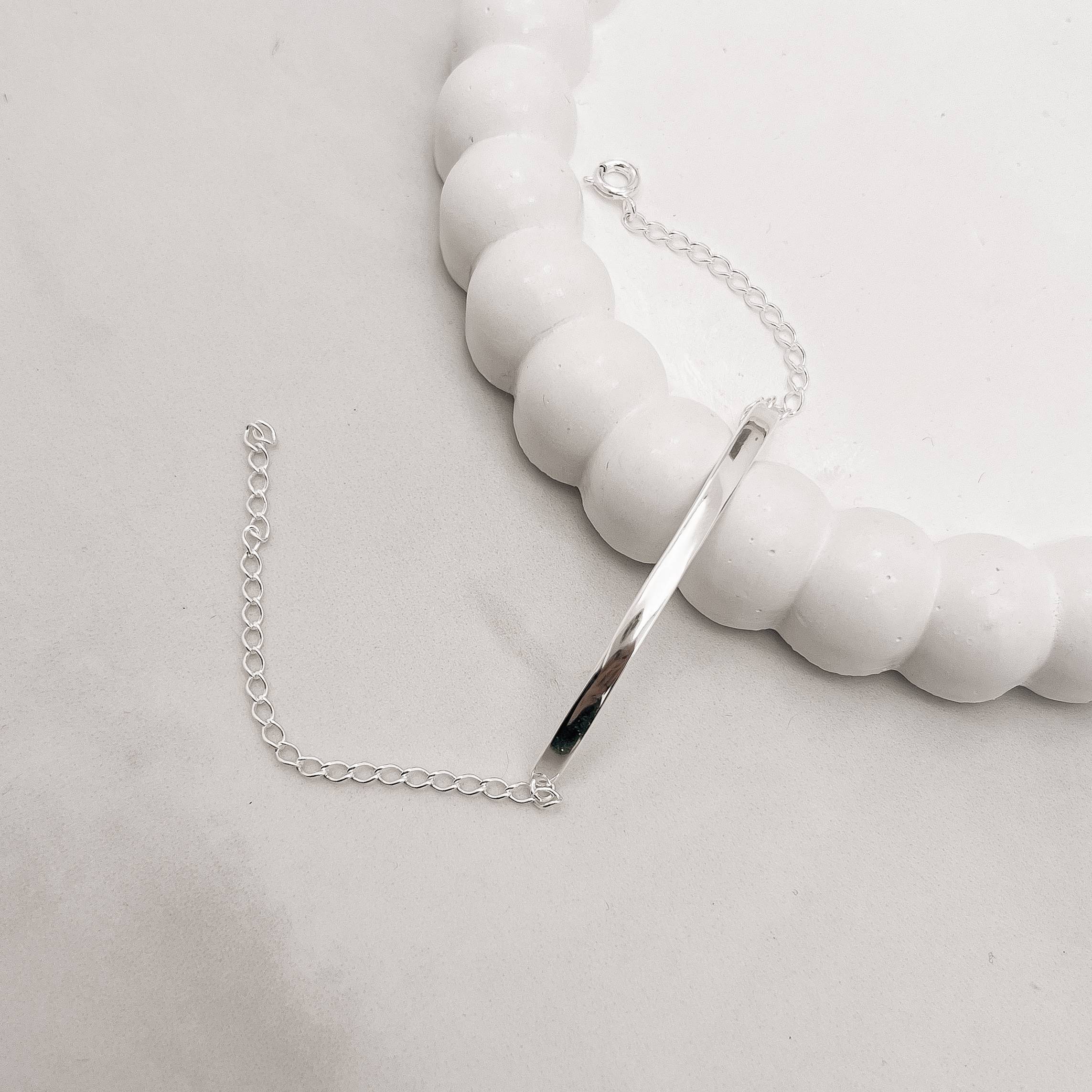 Imagem Secundária Pulseira entremeio fio rígido achatado corrente grumet