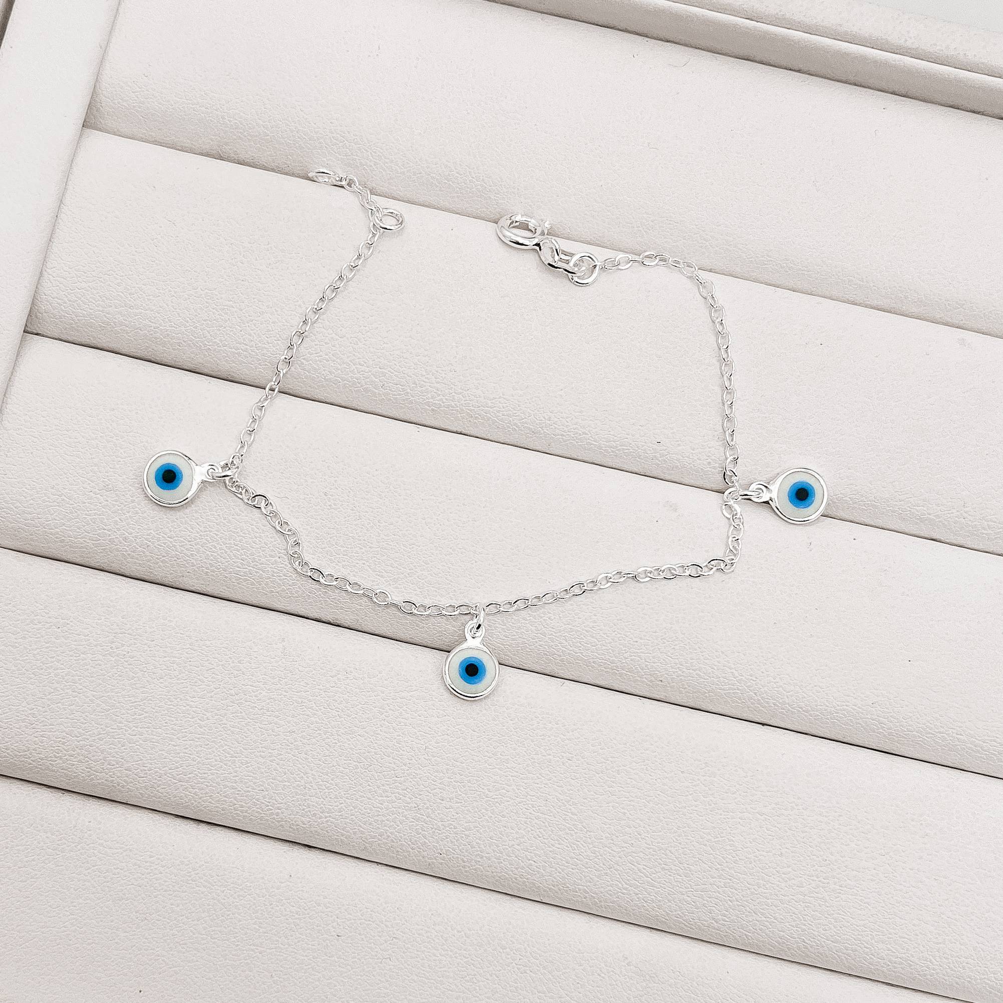 Pulseira 3 pingentes olho grego 7mm