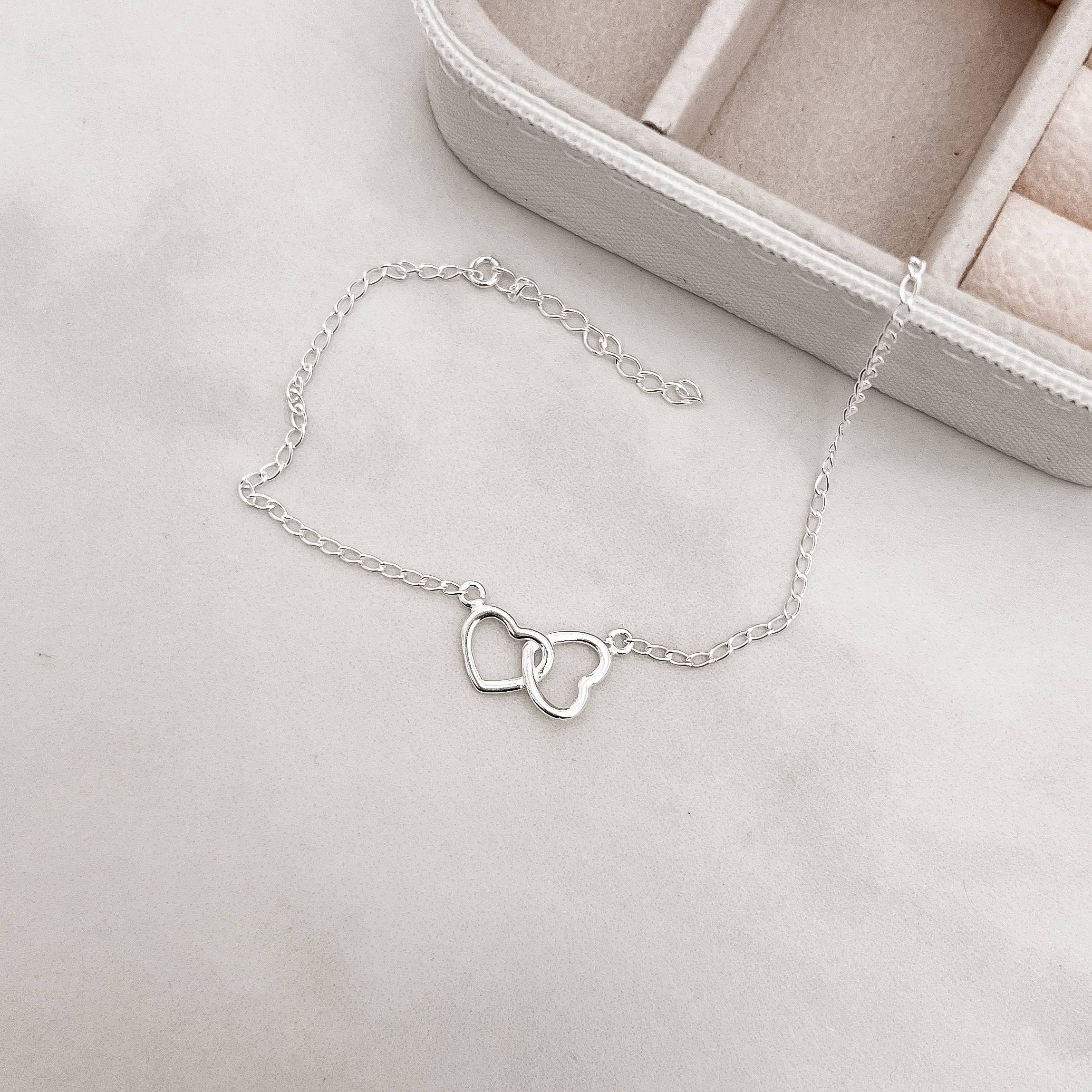 Pulseira entremeio dois corações vazados 16mm