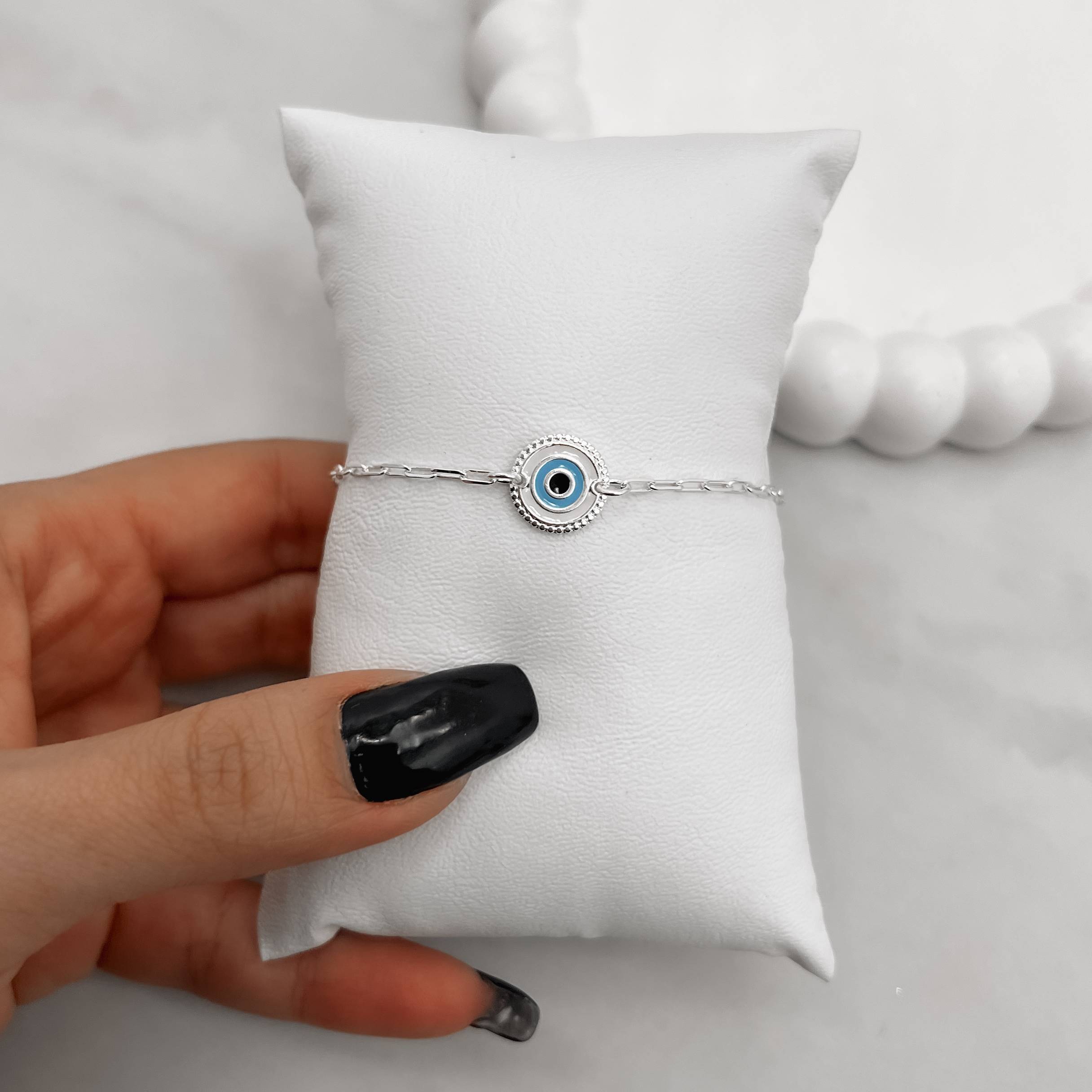 Pulseira entremeio medalha olho grego 11mm resina