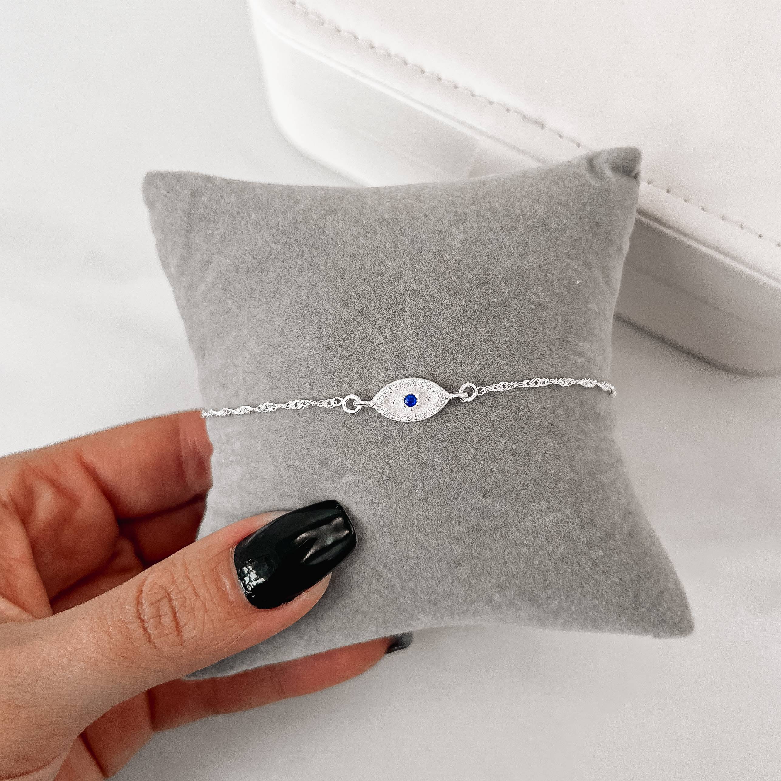 Pulseira entremeio olho grego cravejado 12mm corrente singapura