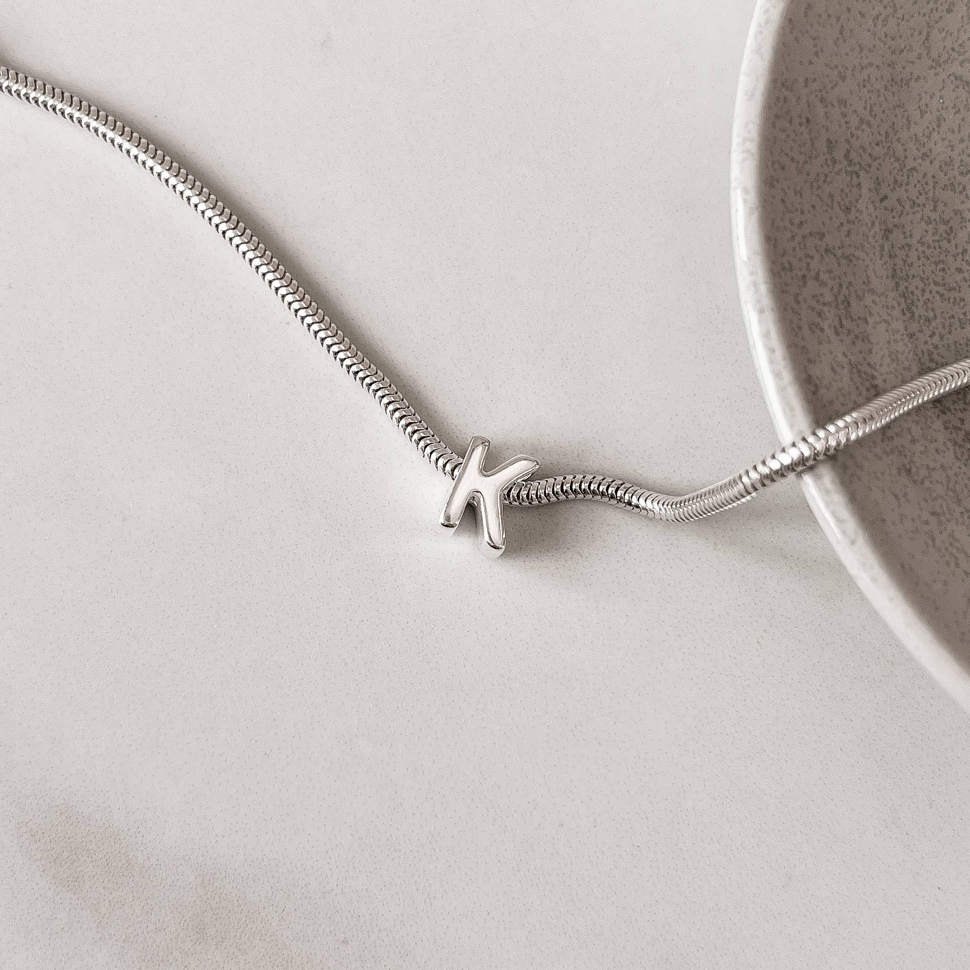 Berloque separador letra K 10mm