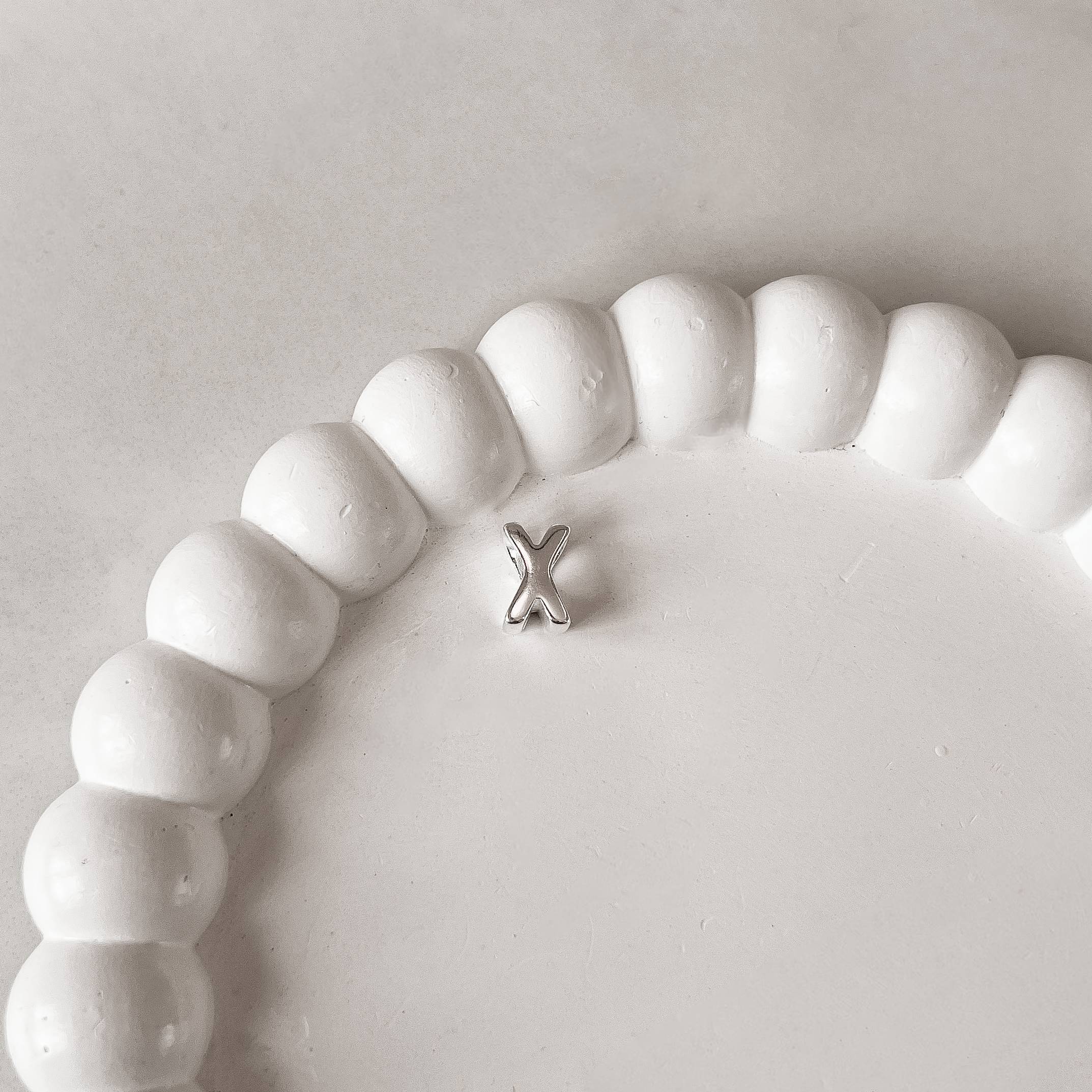 Imagem Secundária Berloque separador letra X 10mm