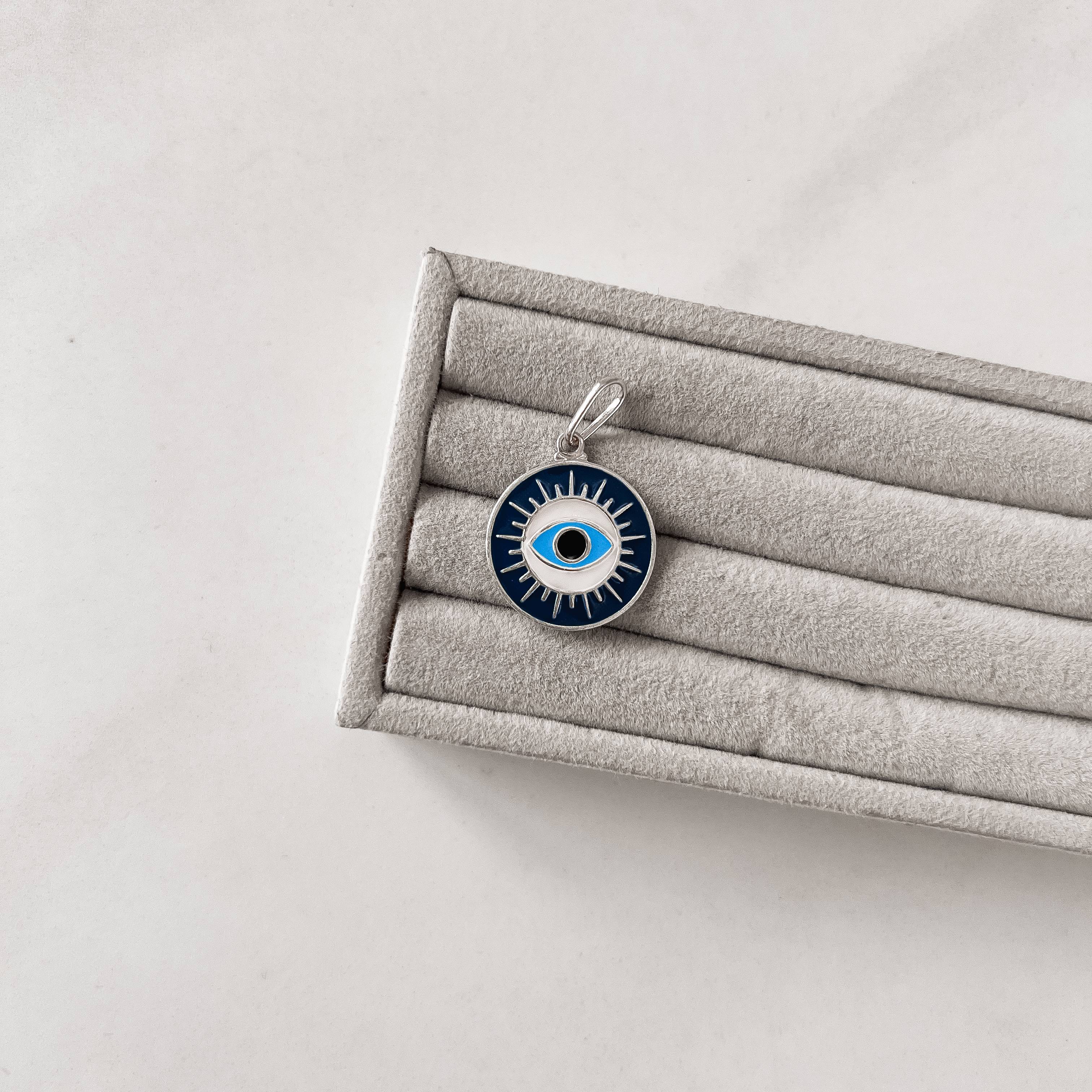 Pingente medalha olho 20mm resina