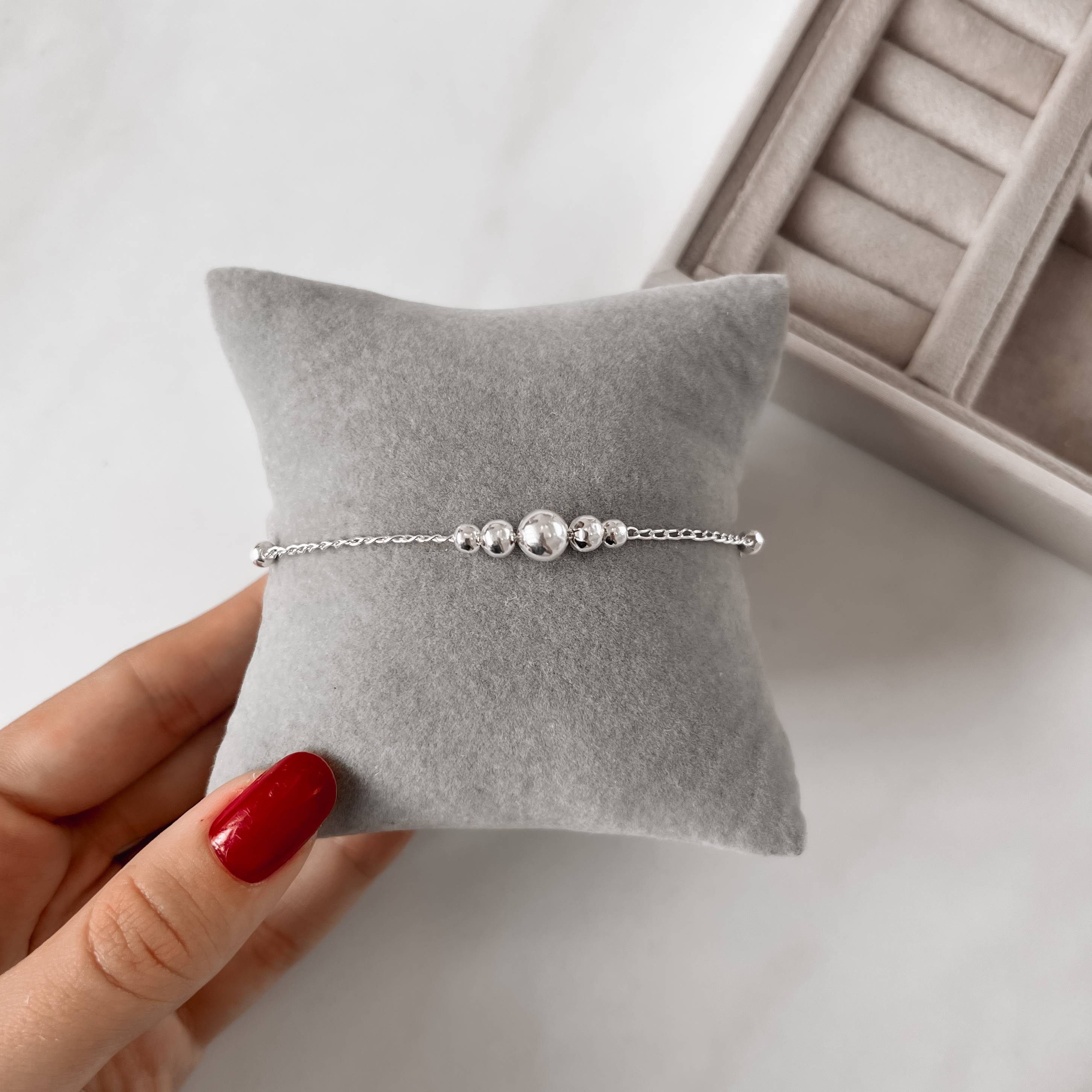 Imagem Secundária Pulseira entremeios bolas