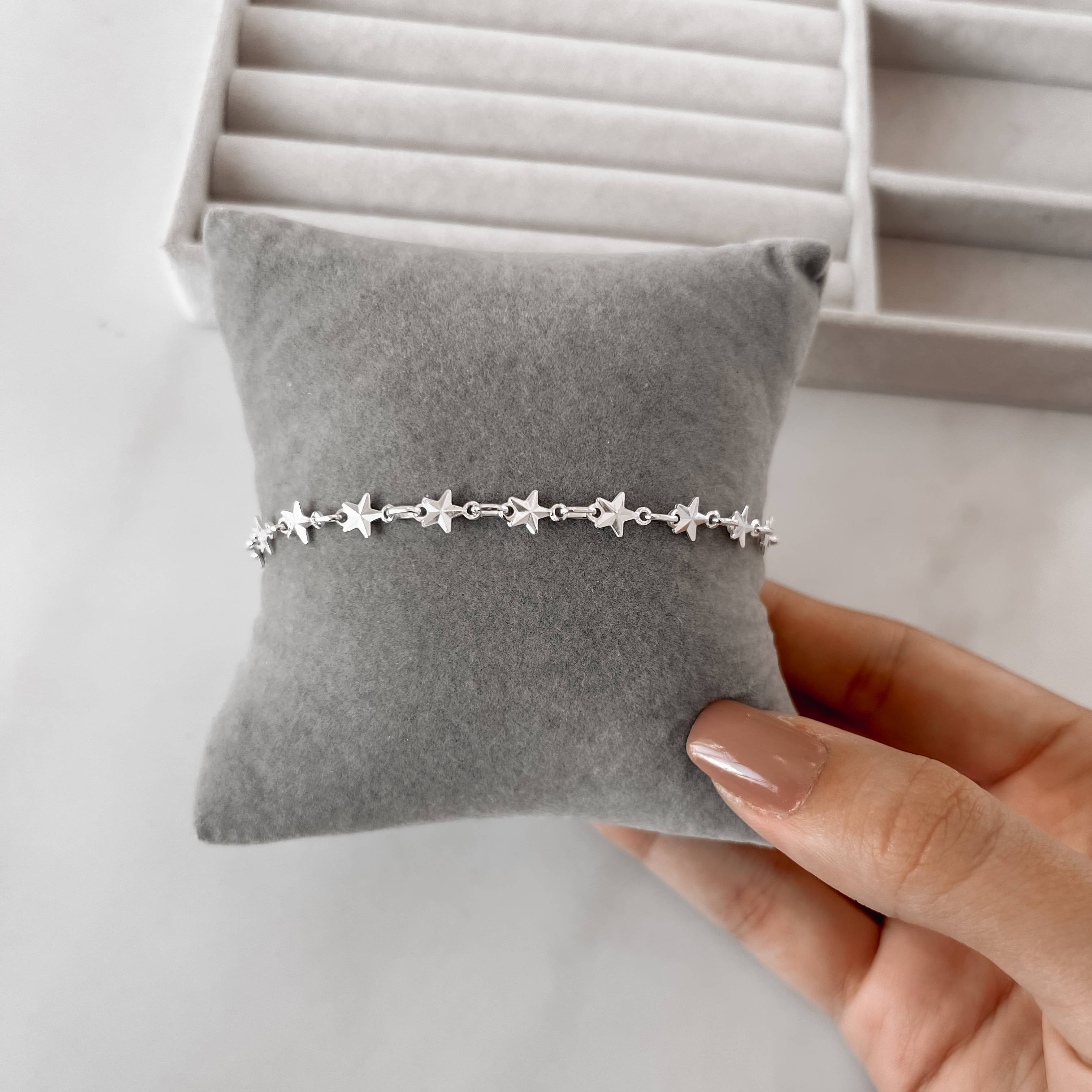 Pulseira entremeios estrela com vinco