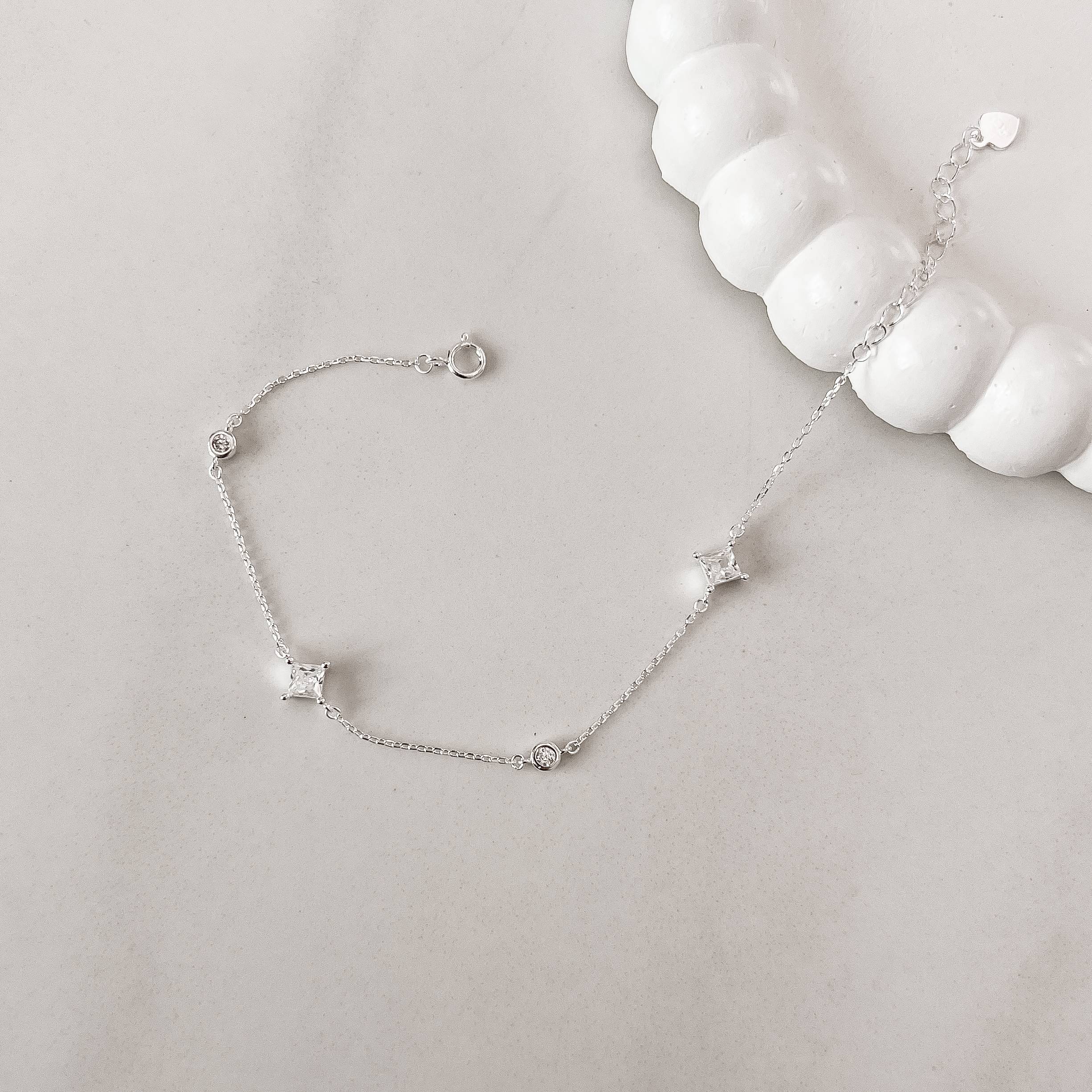 Pulseira entremeio zircônias redonda 3mm e losango 6mm