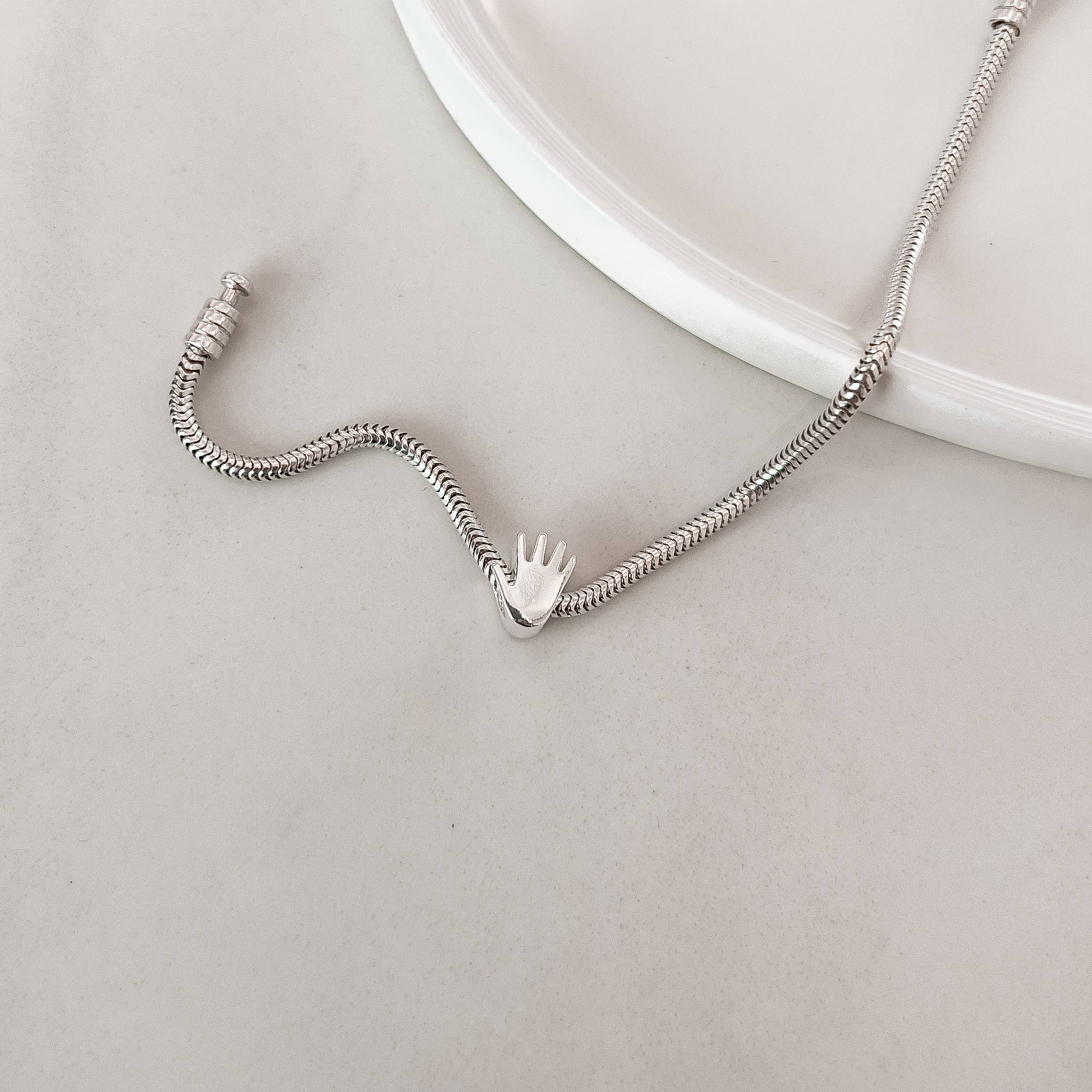 Berloque separador símbolo síndrome de down 10mm