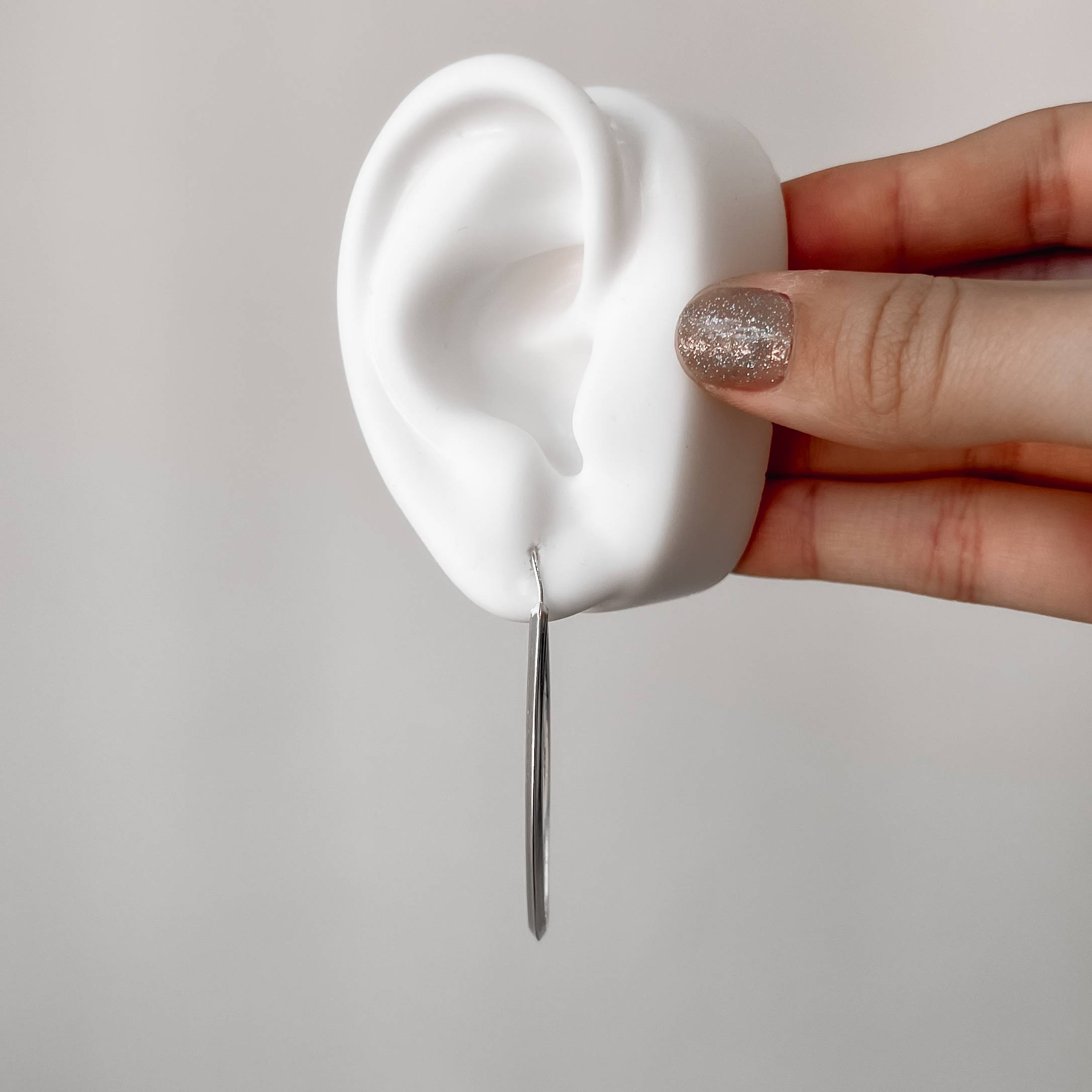 Imagem Secundária Argola oval 50x21mm fio triângulo