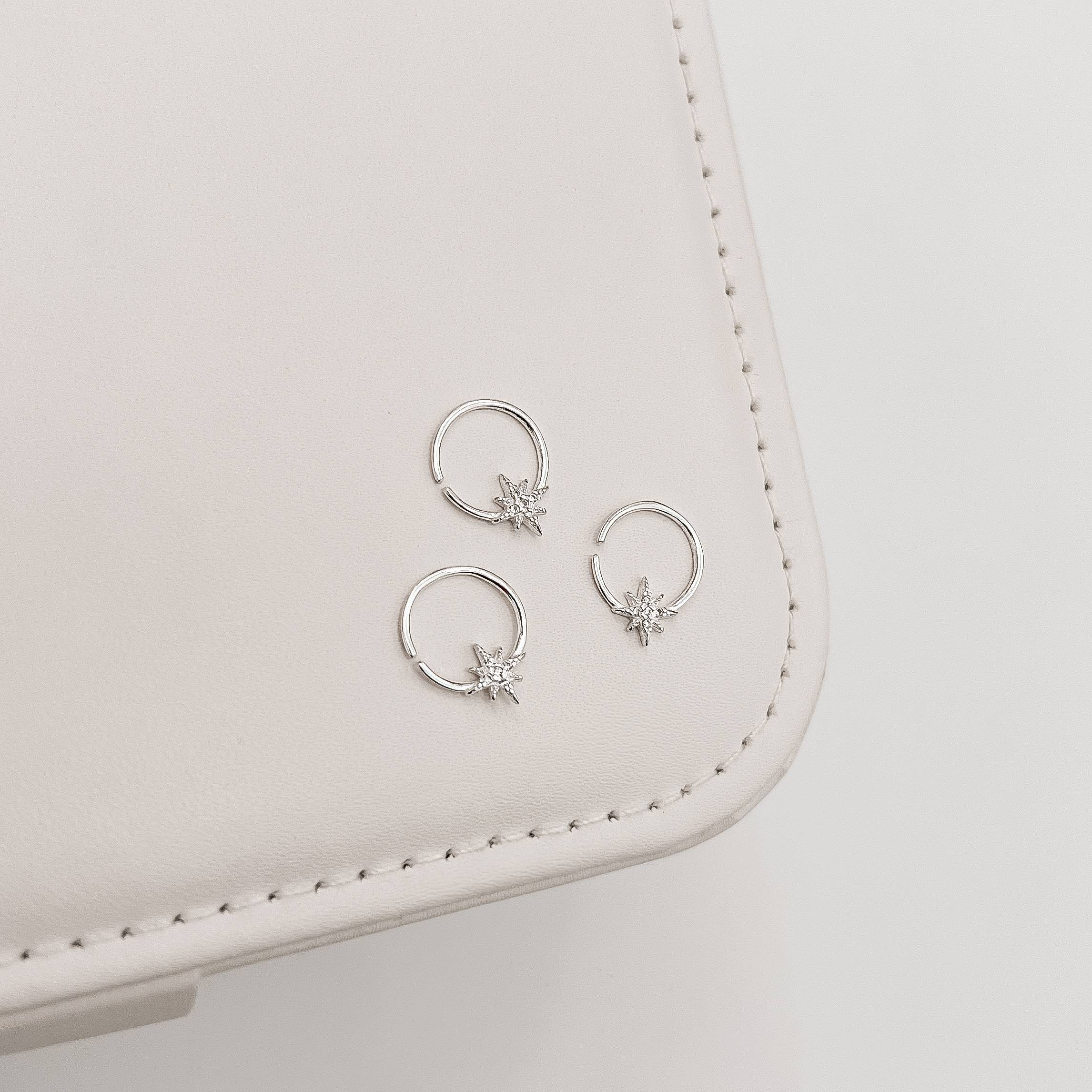 Piercing argola com estrela 8 pontas cravejada 11mm