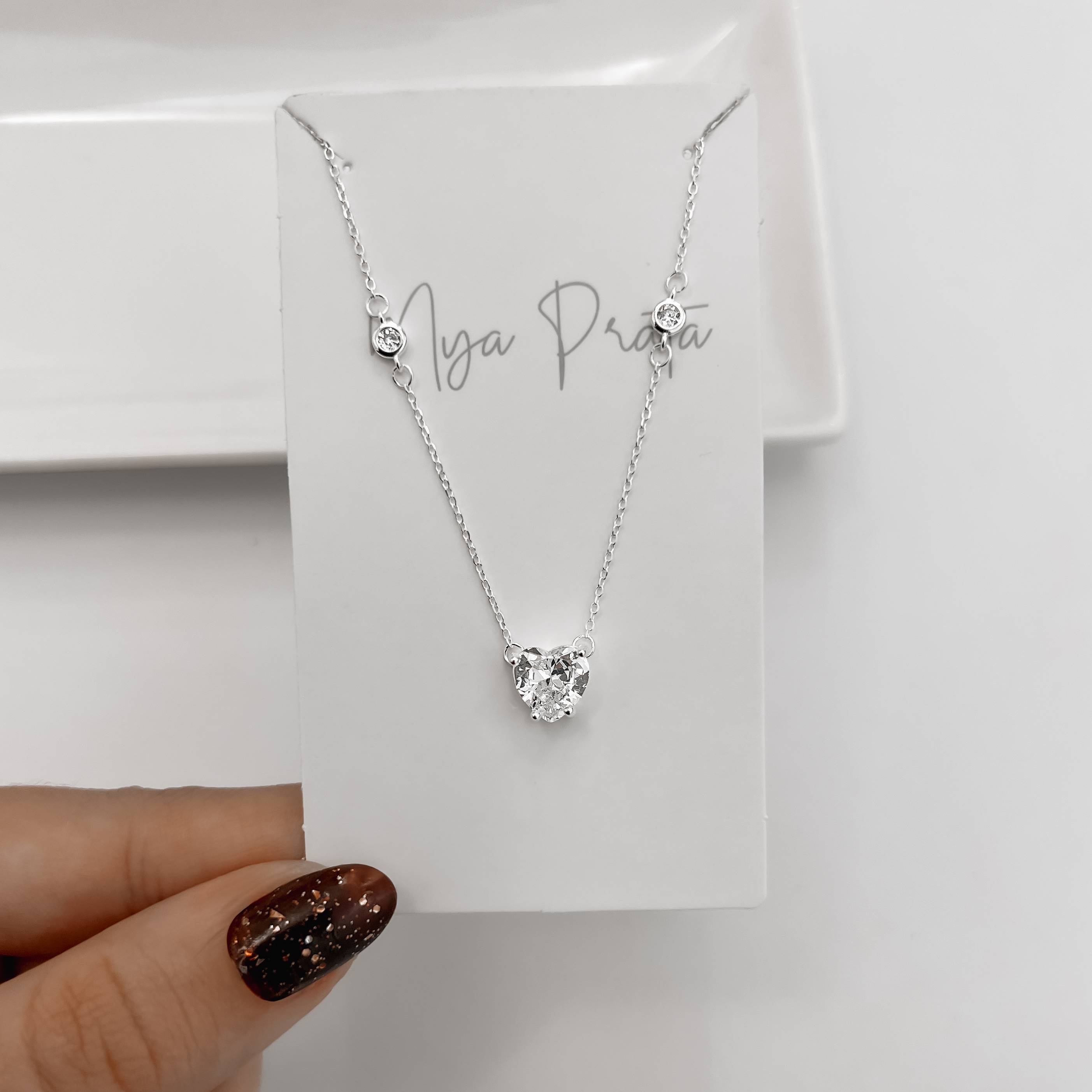 Imagem Colar entremeios zircônias coração 8mm e redondas 3mm 40+5cm