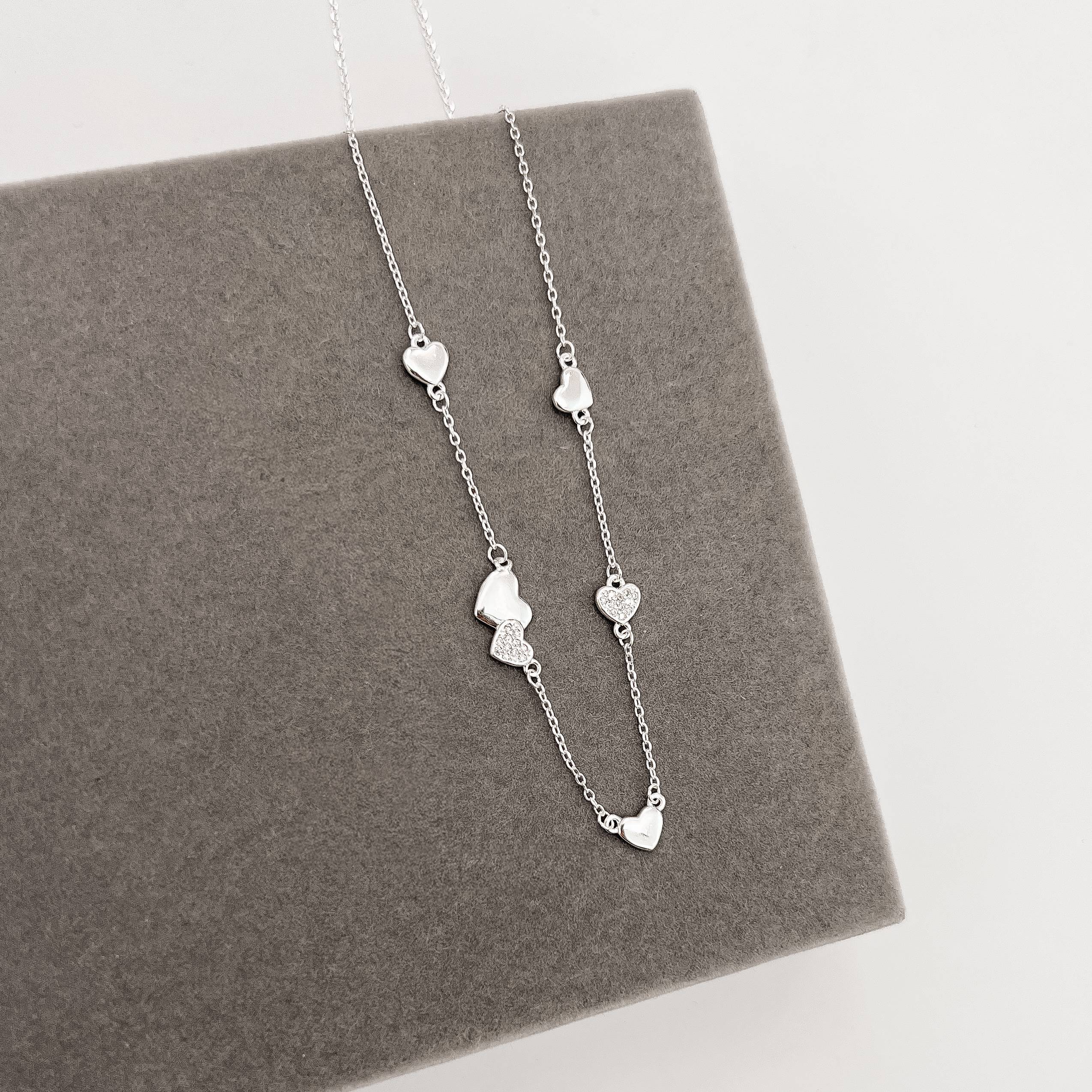 Imagem Colar entremeio corações lisos e cravejados 40+5cm