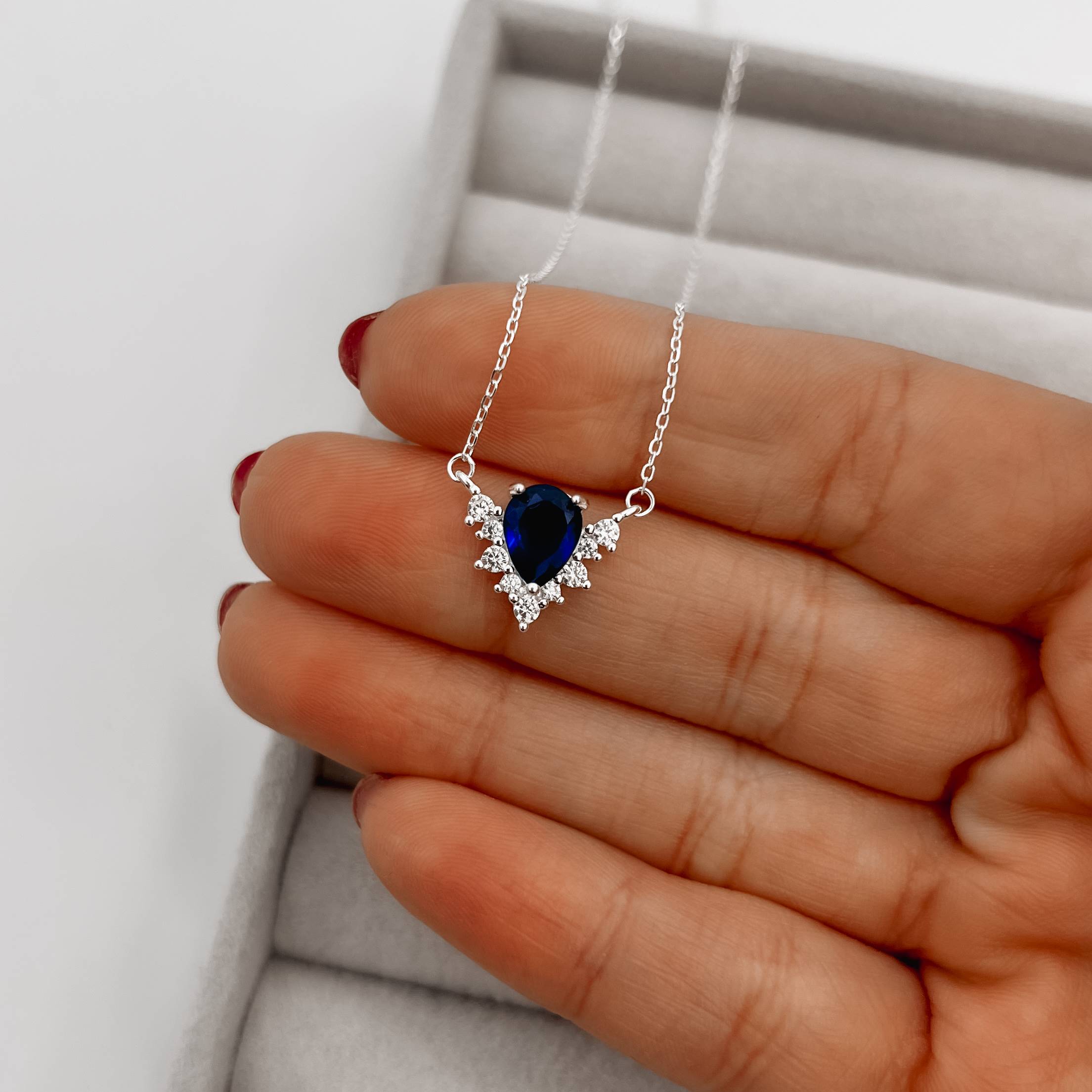 Imagem Secundária Colar entremeio zircônia gota azul escuro com cravejado 12mm 40+5cm