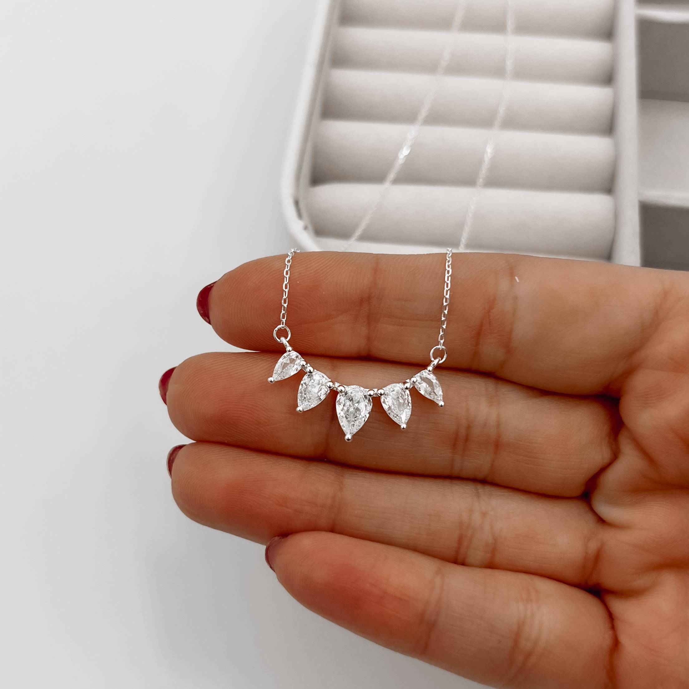 Imagem Secundária Colar entremeio zircônias gota cristal 24mm 40+5cm