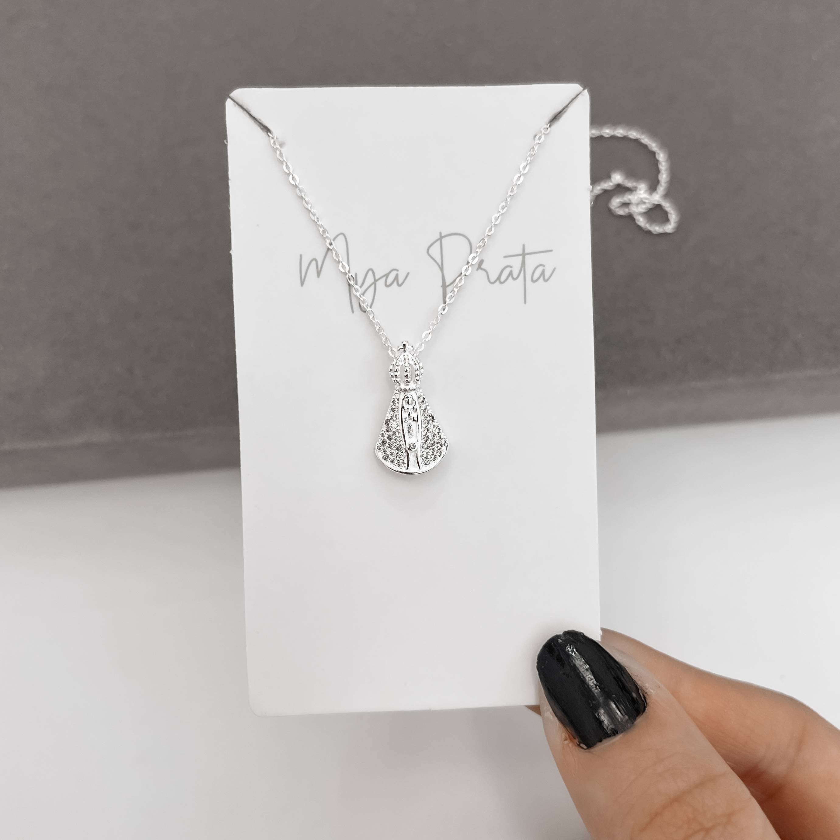 Imagem Colar Nsa. Sra. Aparecida cravejada 18mm corrente cadeadinho 45cm