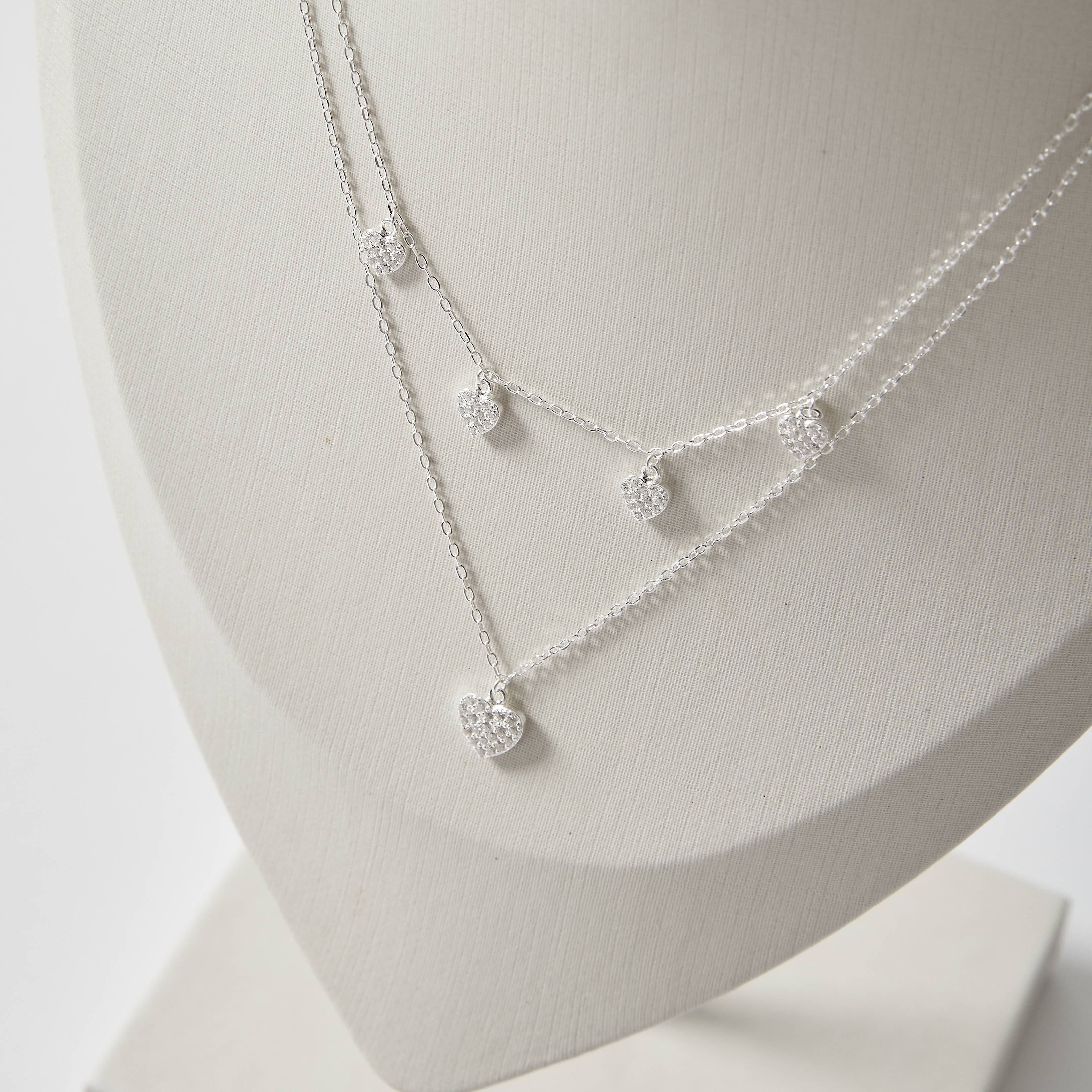 Imagem Secundária Colar duplo pingentes corações cravejados 5mm 40cm e coração cravejado 8mm 45+5cm