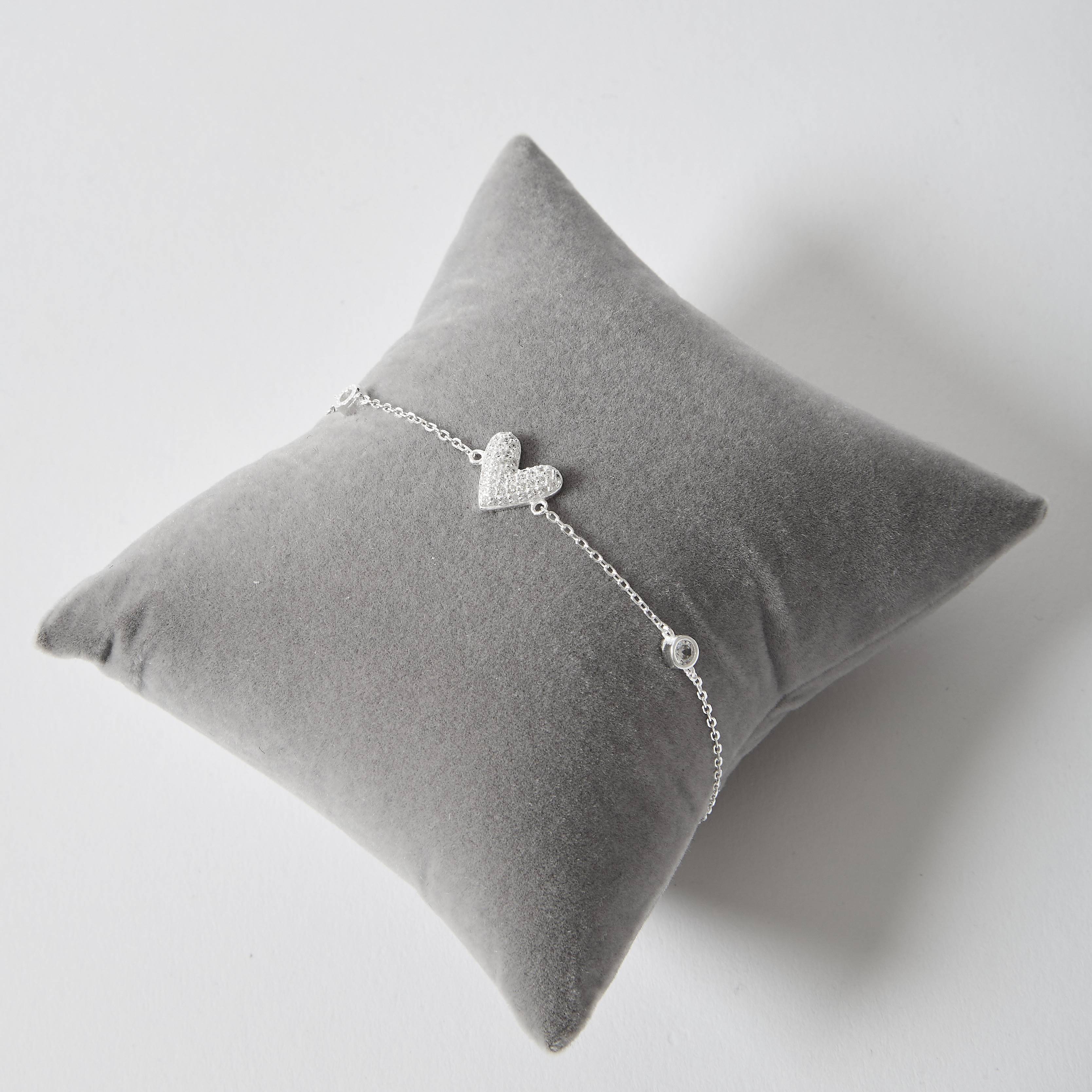 Imagem Secundária Pulseira entremeios zircônias e coração cravejado 10mm 16+5cm