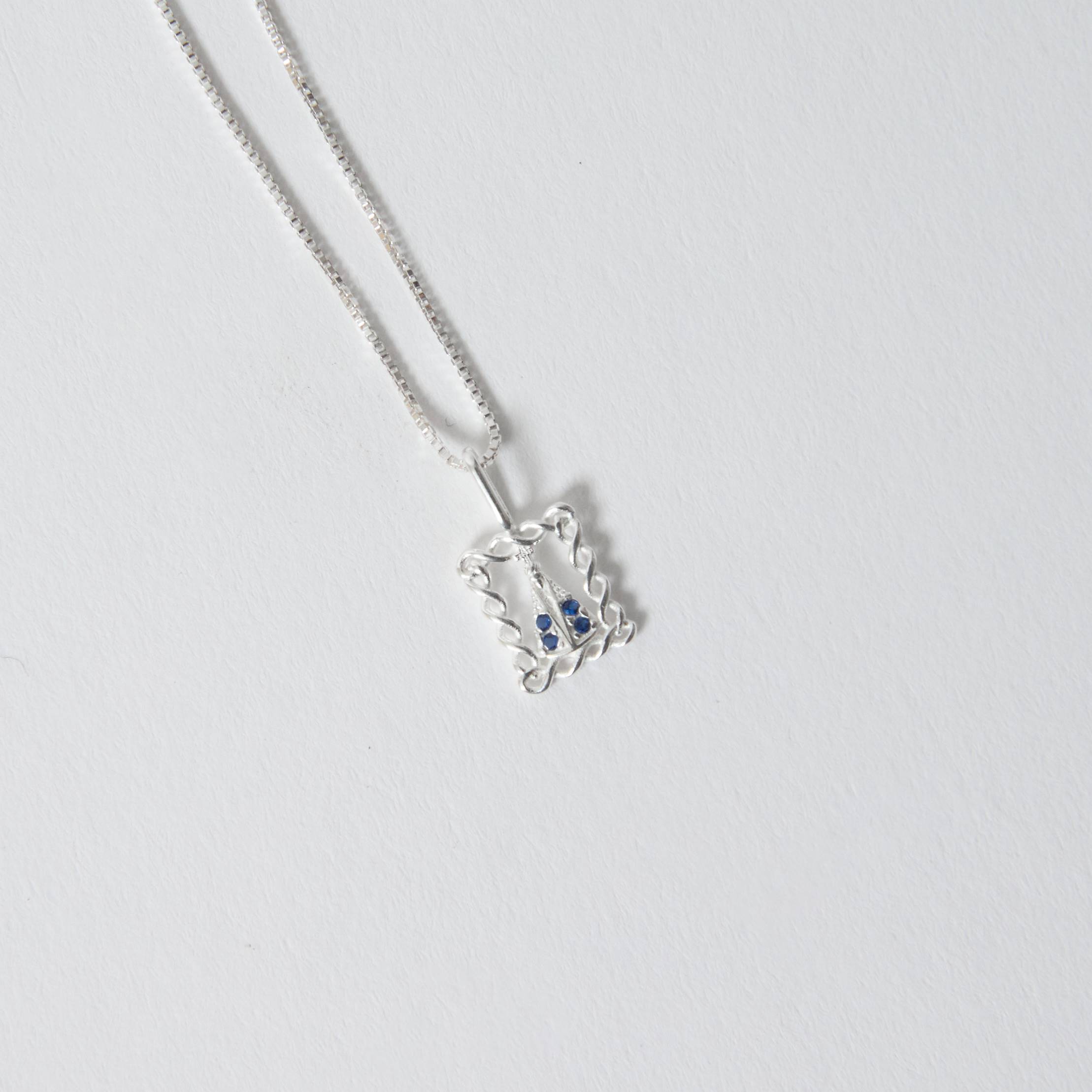 Imagem Colar pingente medalha Nsa. Sra. Aparecida cravejada azul 9mm 45cm