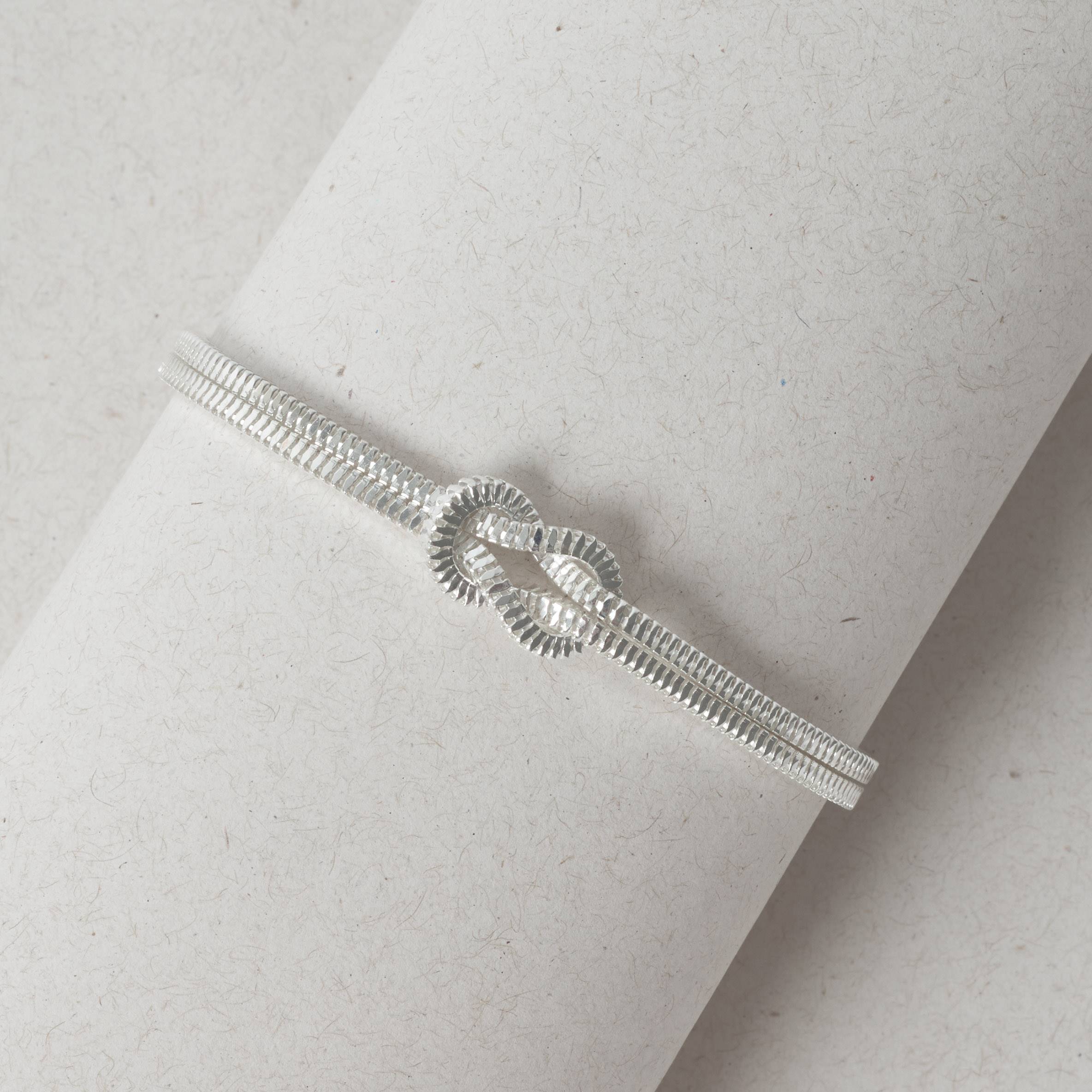 Pulseira corrente dupla com nó 19cm