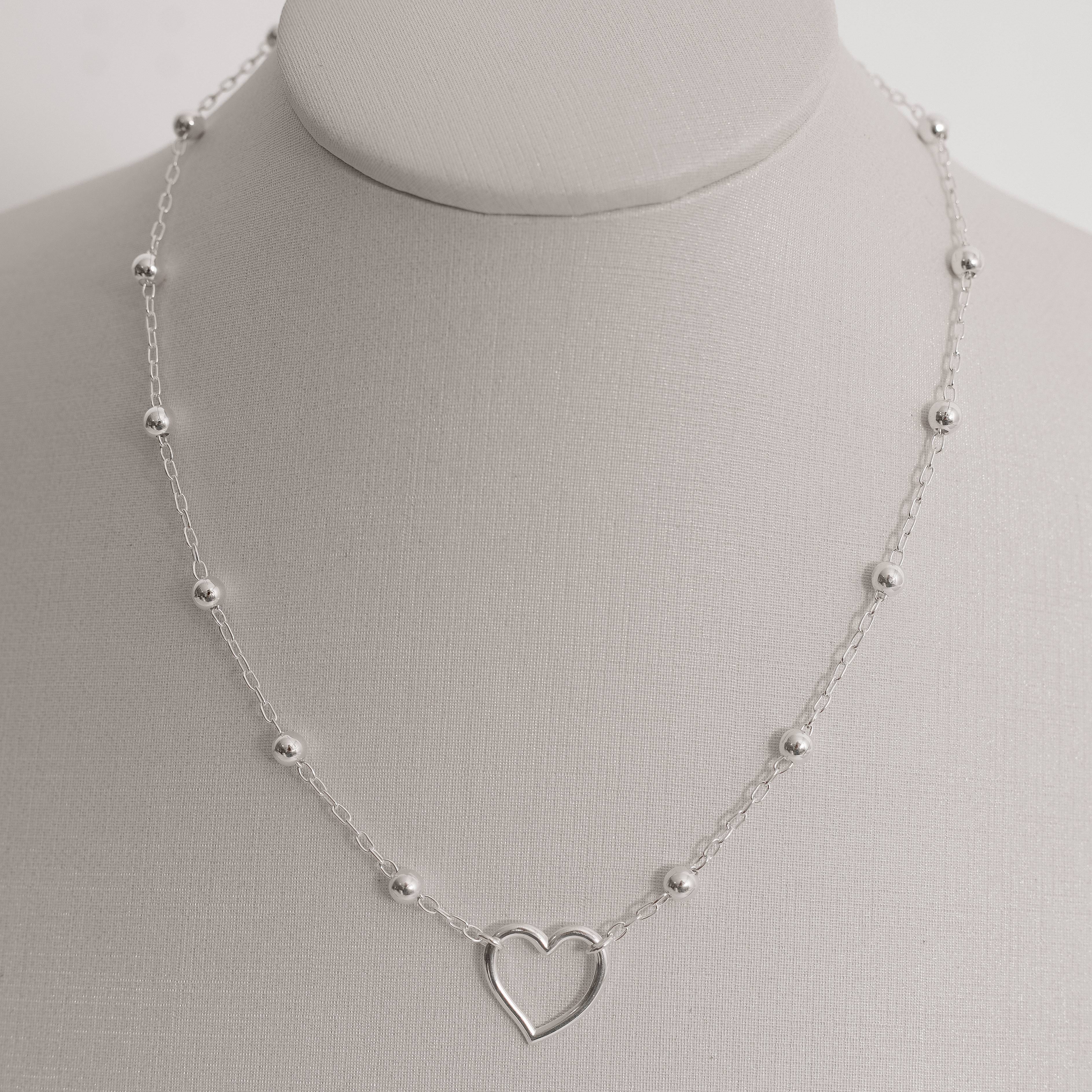 Imagem Choker entremeio bolas e coração vazado 14mm com extensor