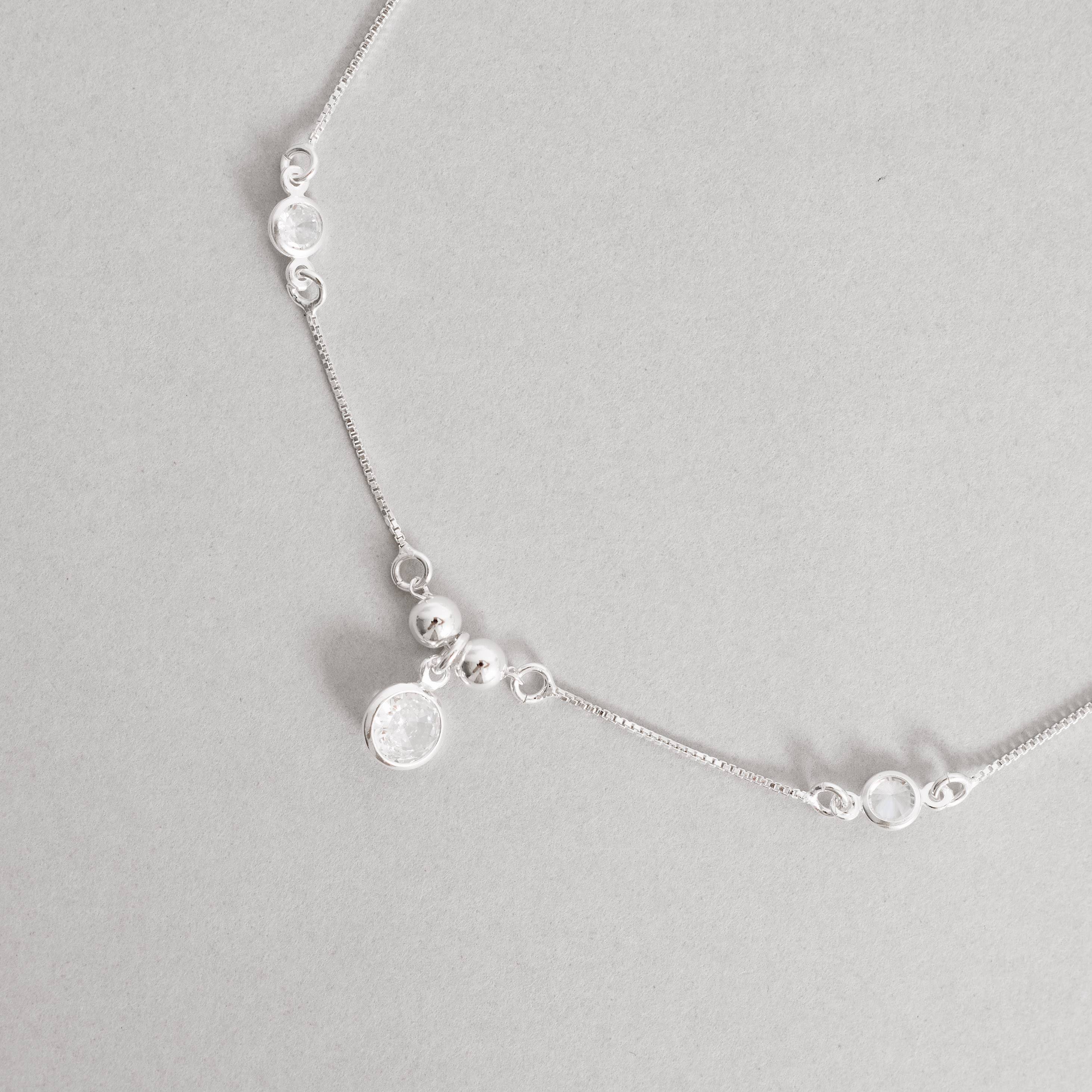 Imagem Pulseira entremeio bolas e zircônias com pingente zircônia 6mm