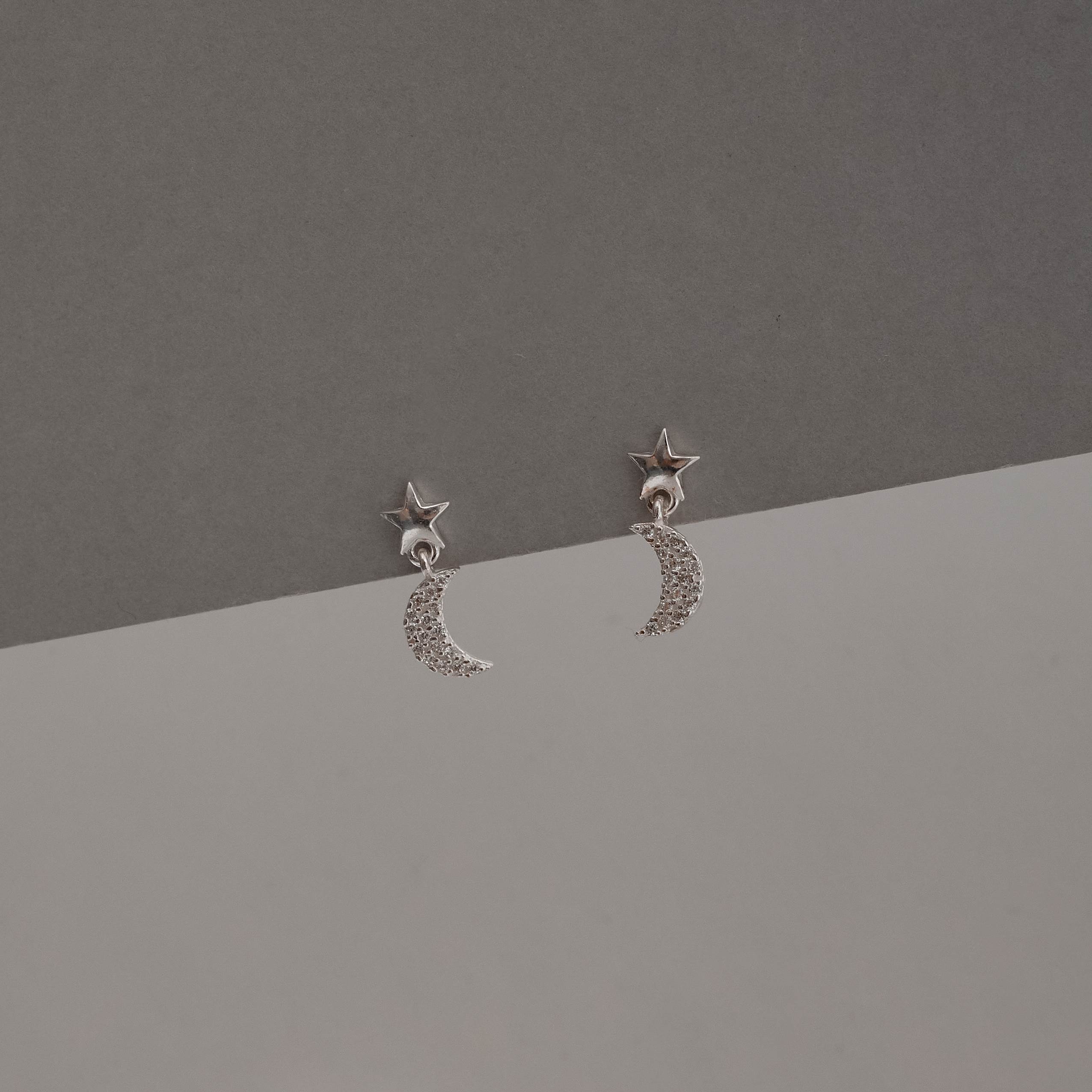 Imagem Secundária Brinco base estrela pingente lua cravejada 8mm
