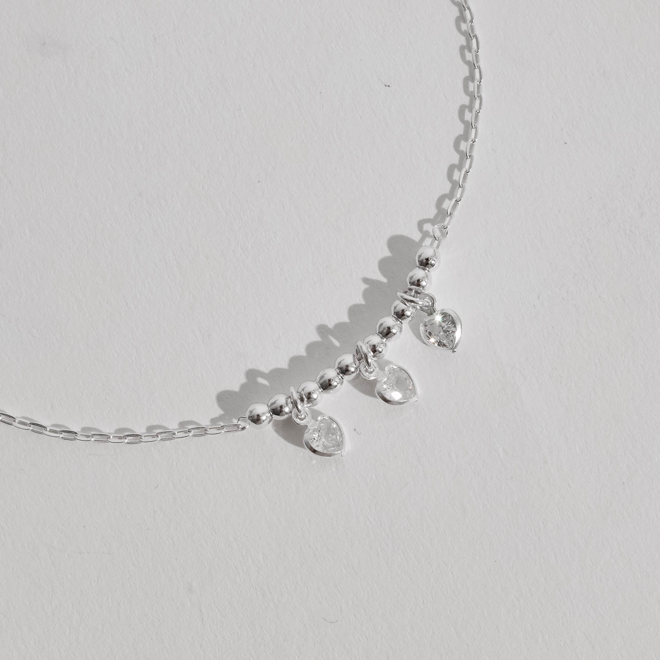 Imagem Pulseira entremeio bolas 3mm pingentes zircônia coração