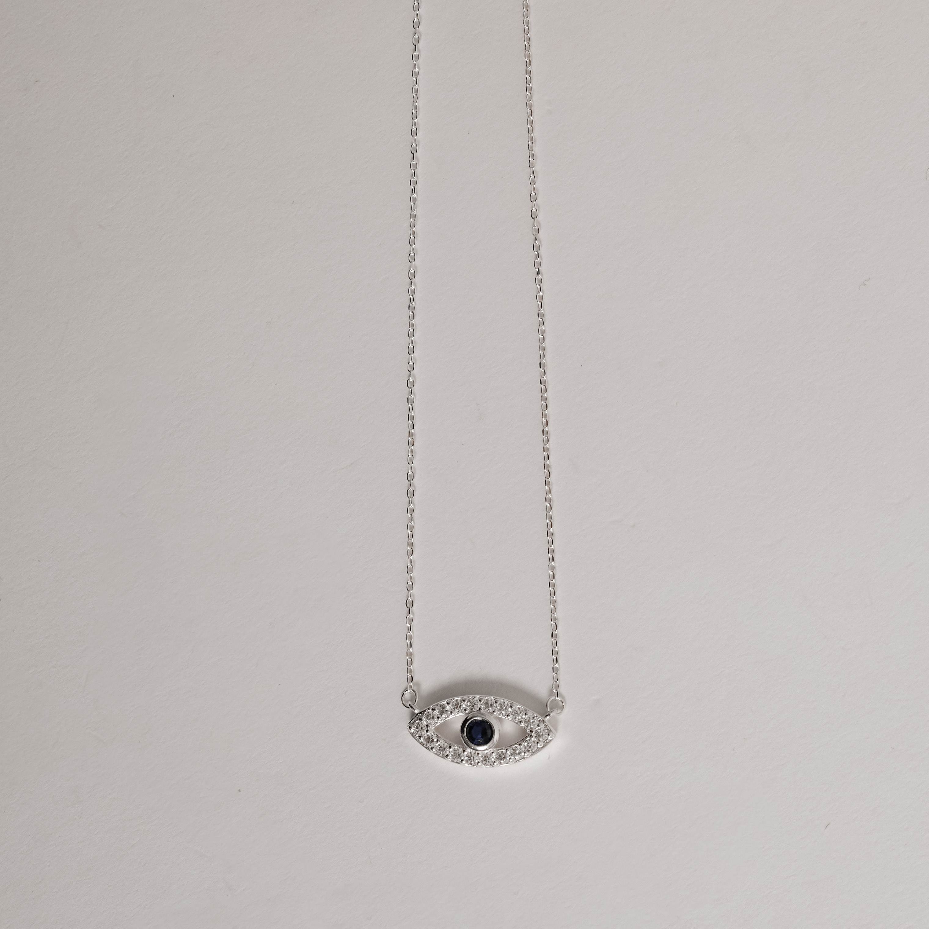 Colar entremeio olho cravejado detalhe zircônia azul 18mm 40+5cm