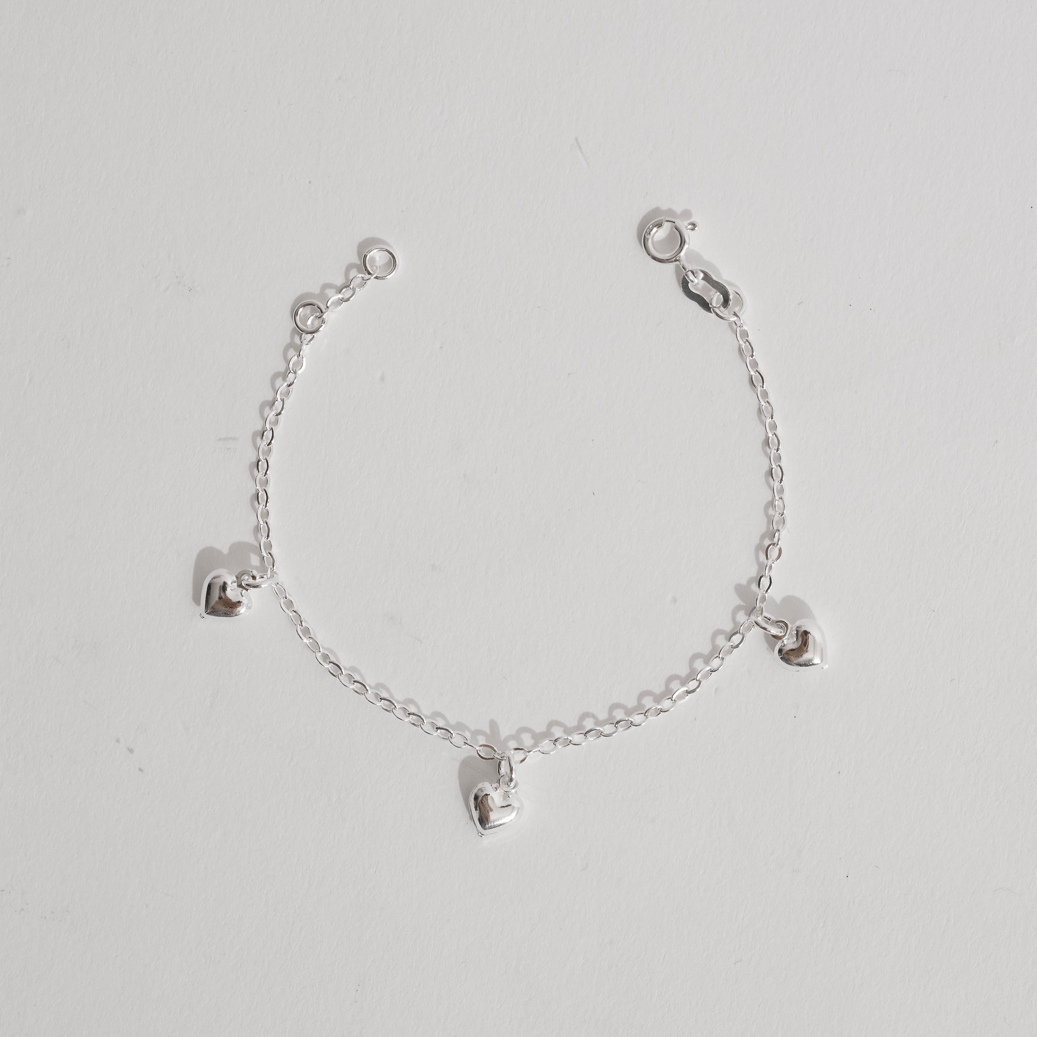 Imagem Pulseira pingentes corações 6mm 19cm
