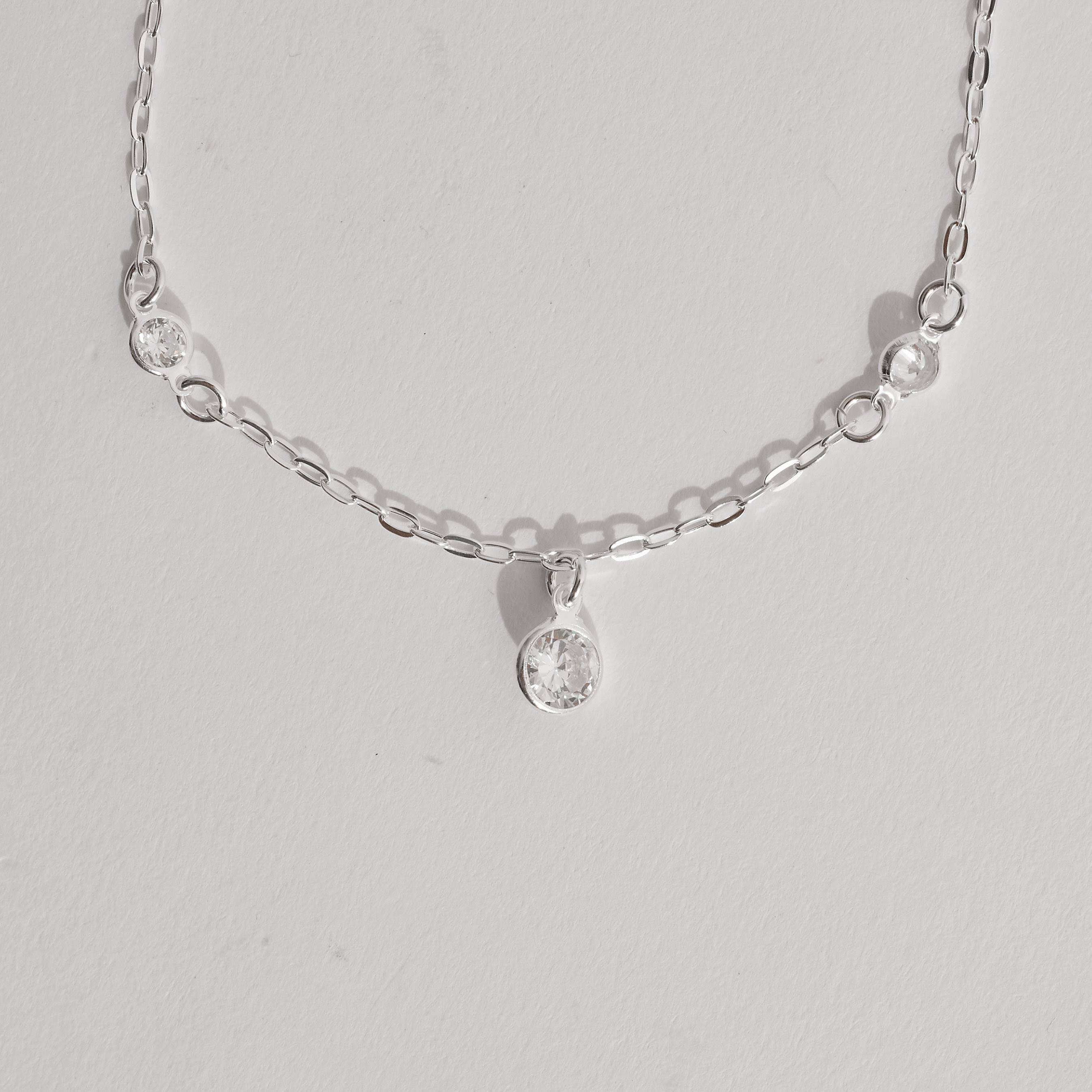 Imagem Pulseira entremeios e pingente zircônias 4 e 7mm 19cm