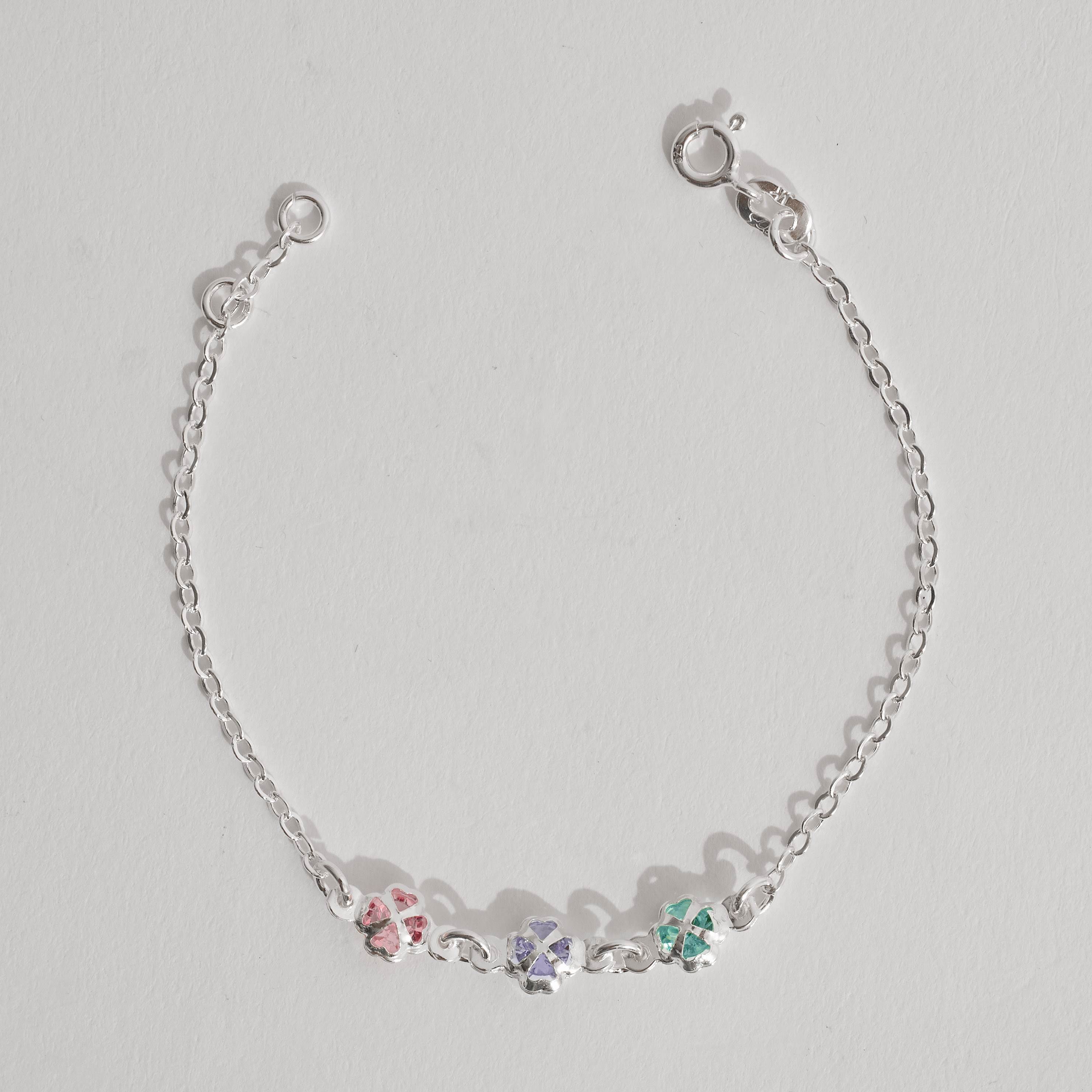 Imagem Pulseira infantil entremeio 3 trevos com zircônias coloridas 6mm 15cm