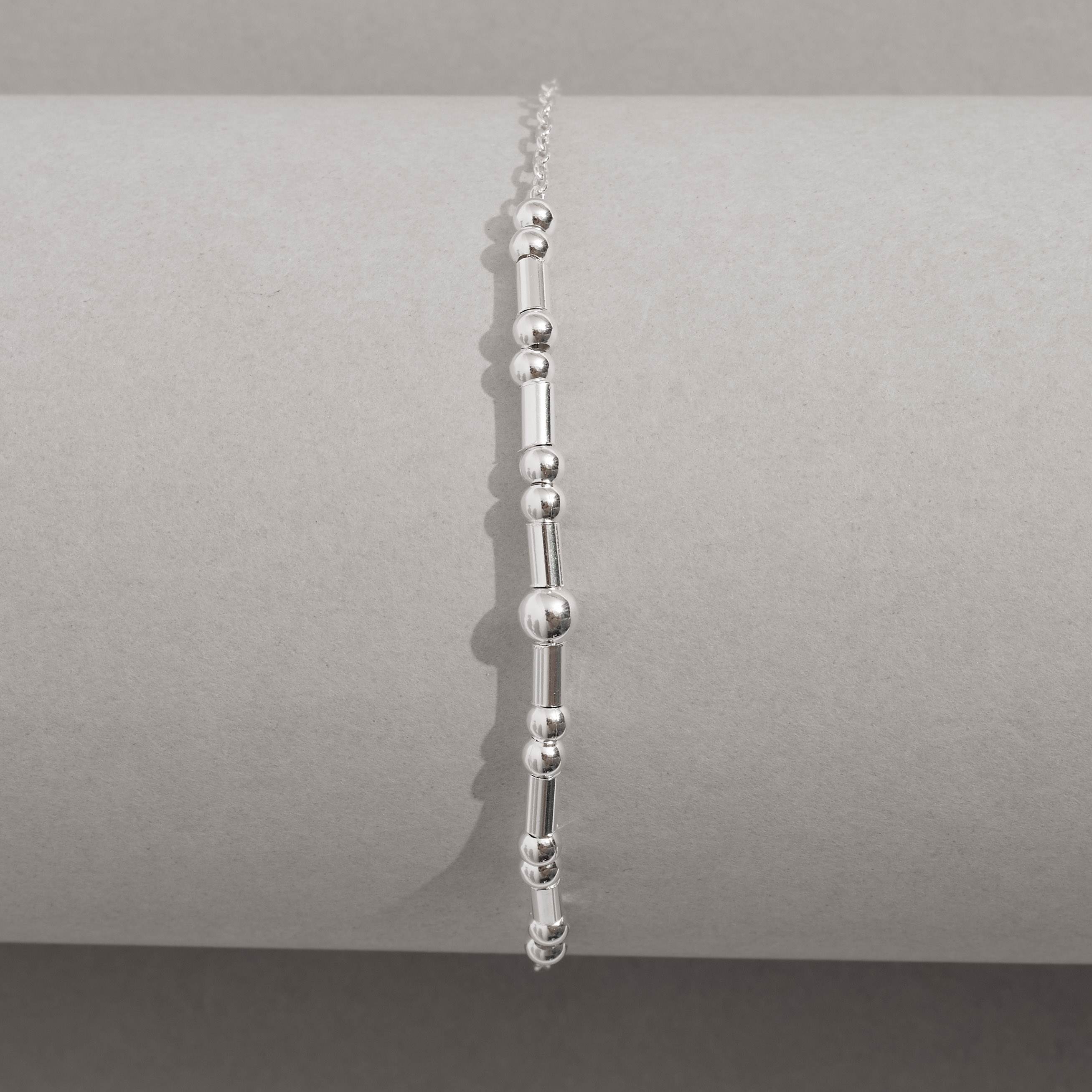 Pulseira entremeios bolas e canutilhos 19cm