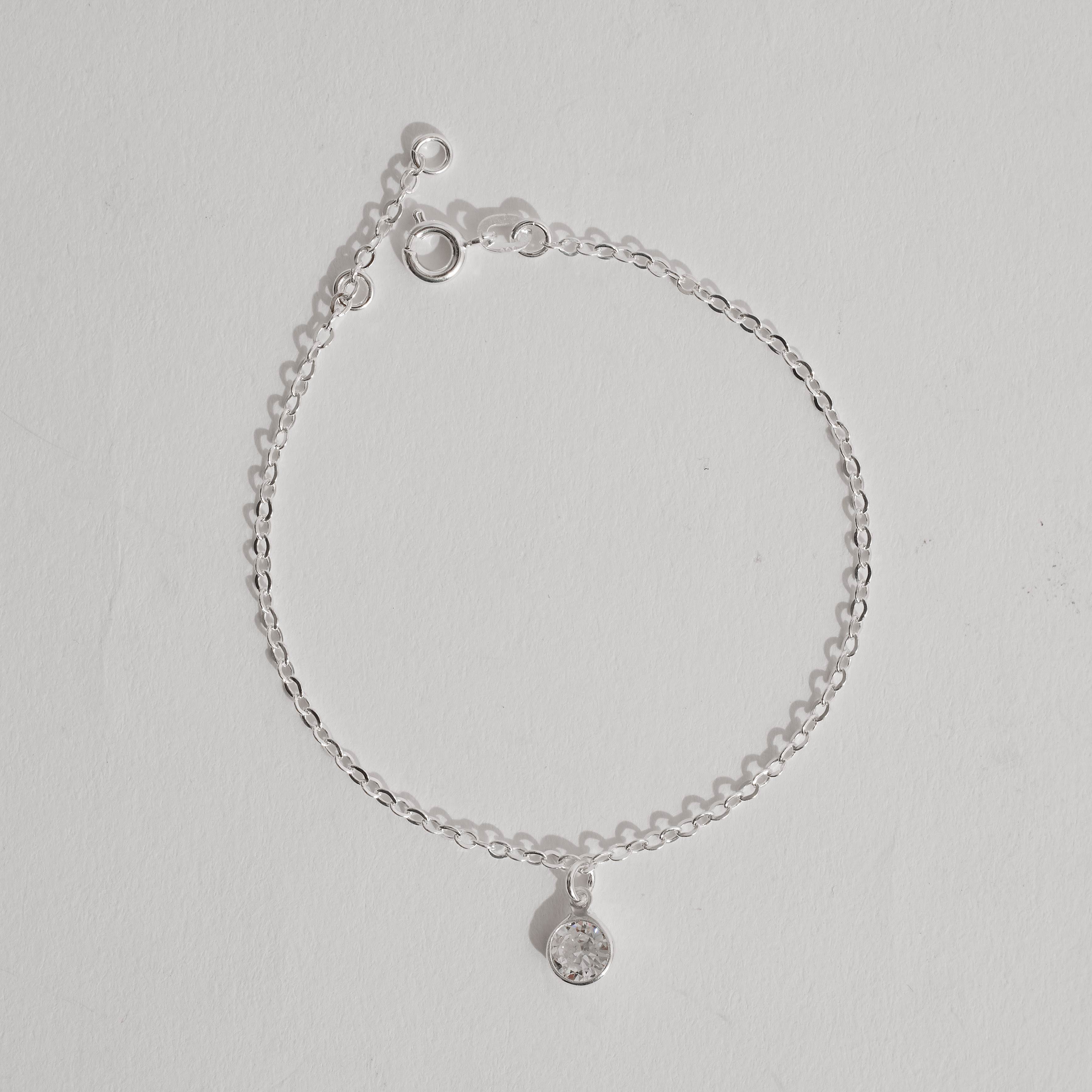Imagem Pulseira pingente zircônia redonda 7mm 19cm