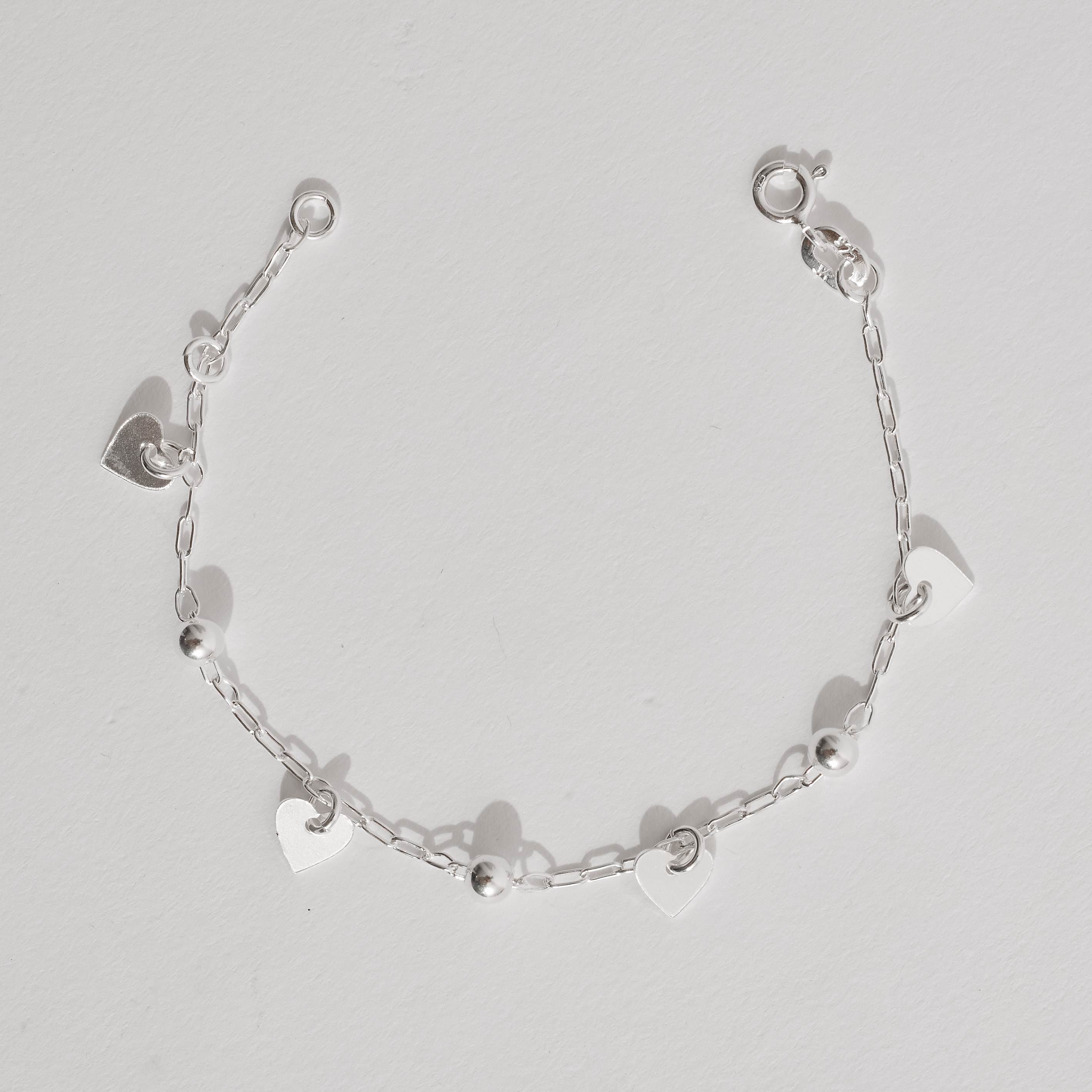 Imagem Pulseira infantil entremeio bolas 4mm pingente corações corrente cartier 15cm