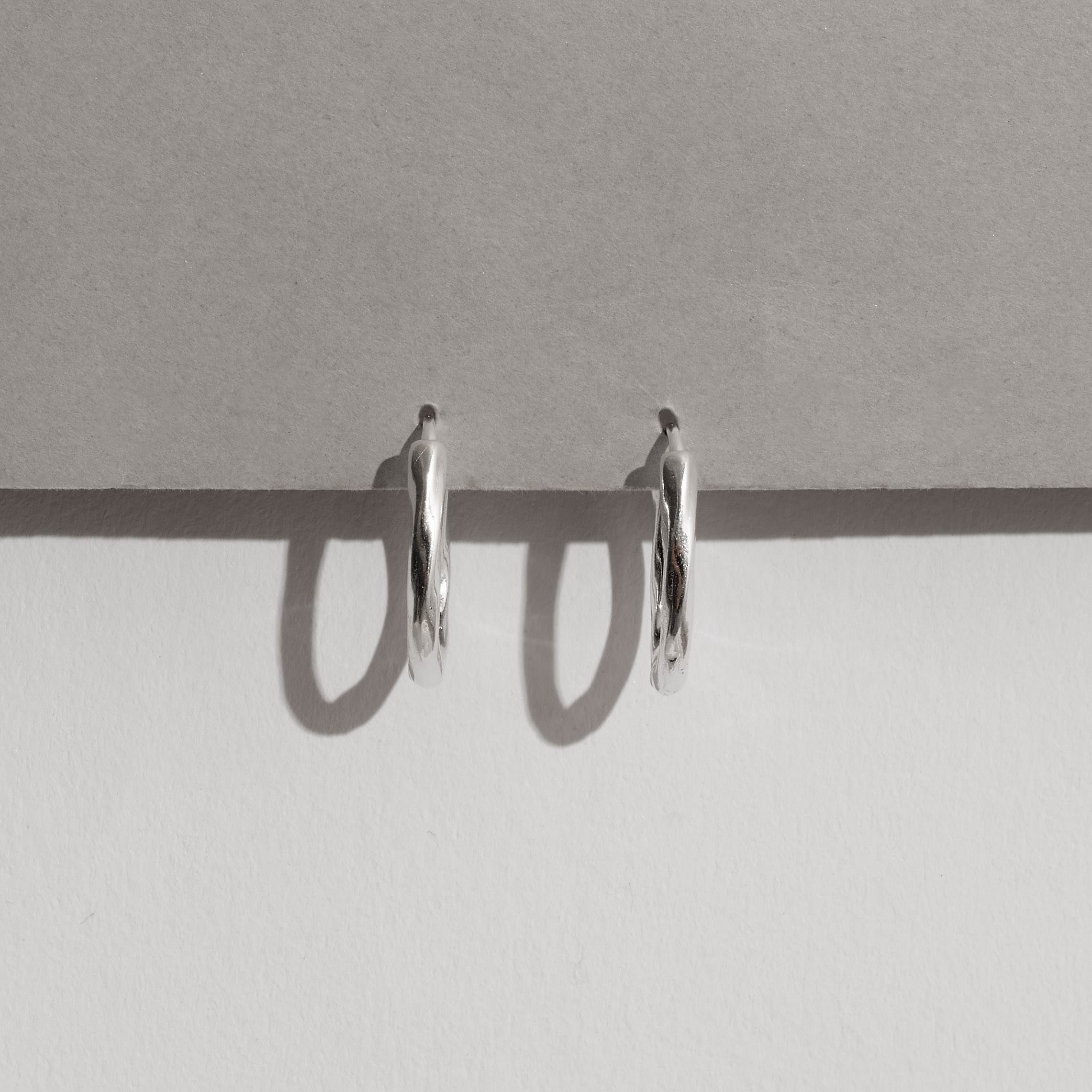 Argola click oval 17mm fio torcido