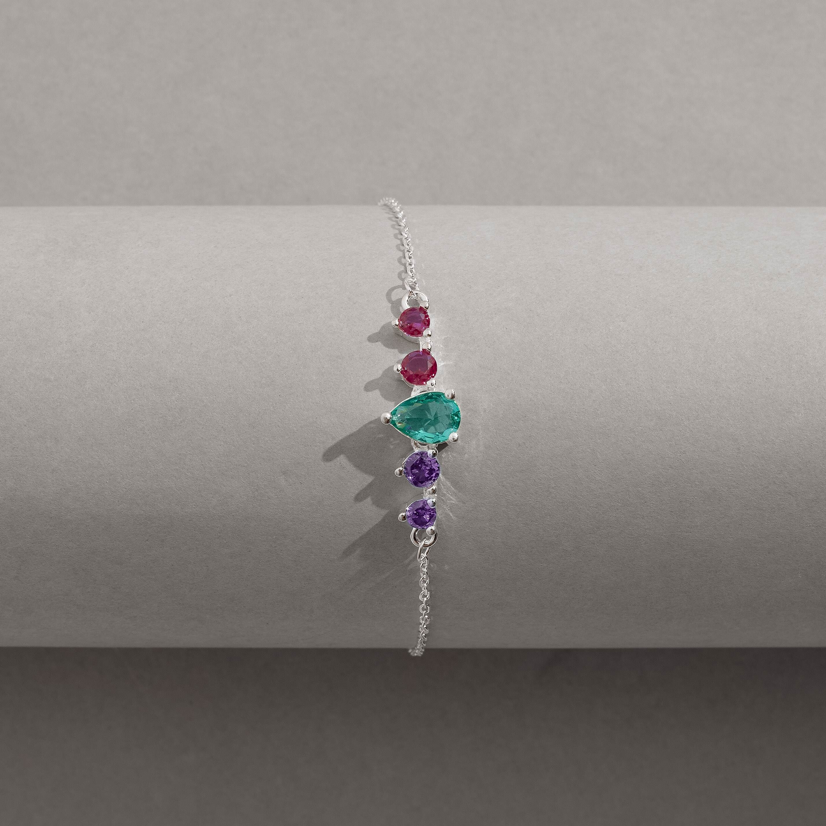 Imagem Secundária Pulseira entremeio zircônias gota acqua e redondas lilás e pink