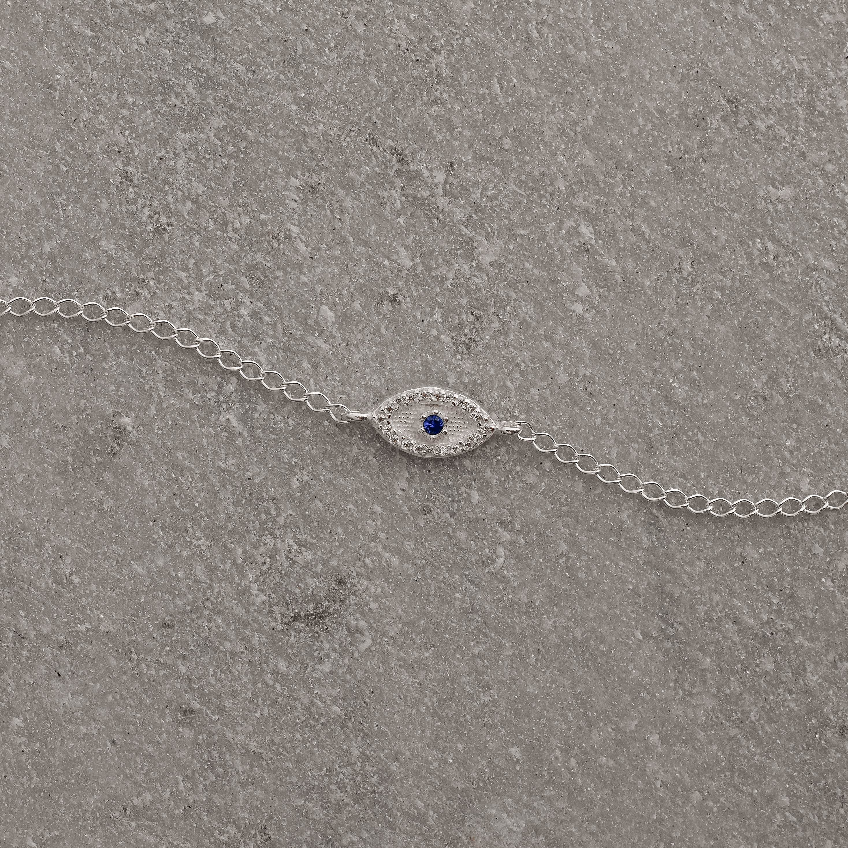 Pulseira entremeio olho cravejado detalhe zircônia azul 12mm