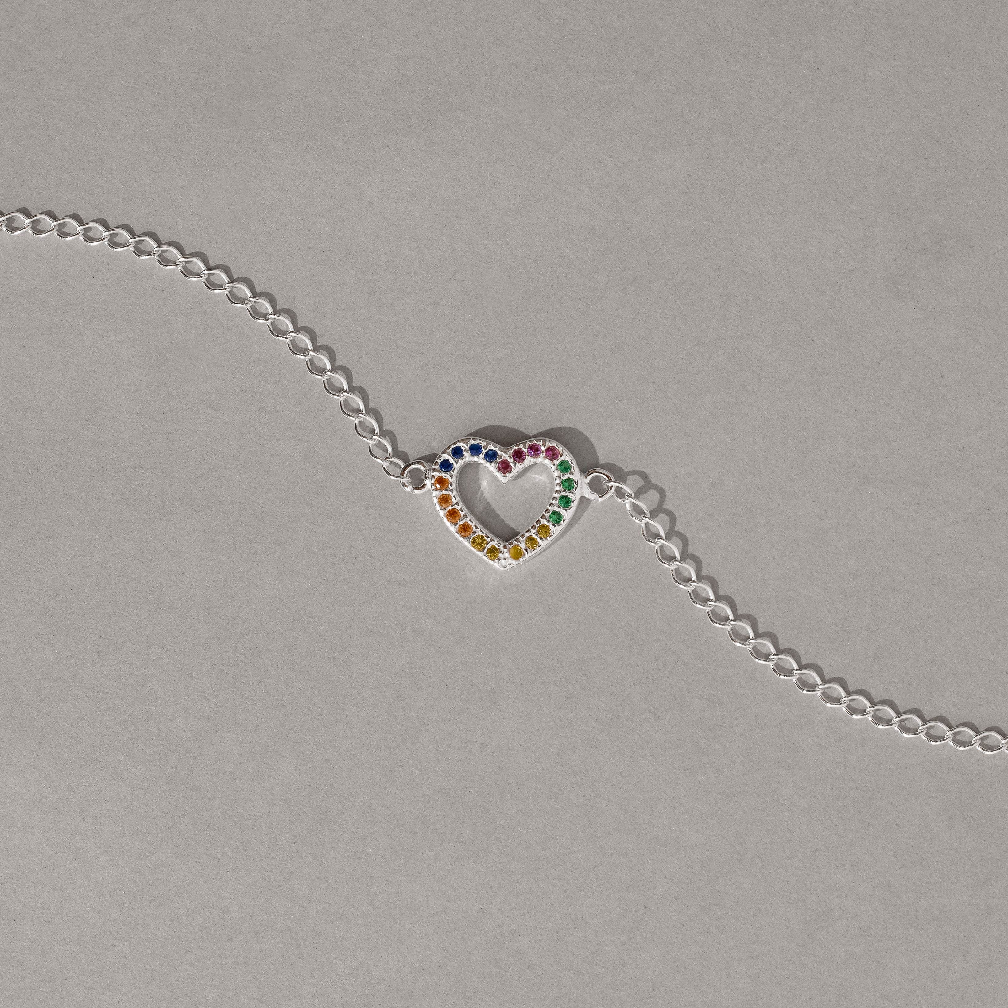 Imagem Secundária Pulseira entremeio coração vazado cravejado colorido 13mm