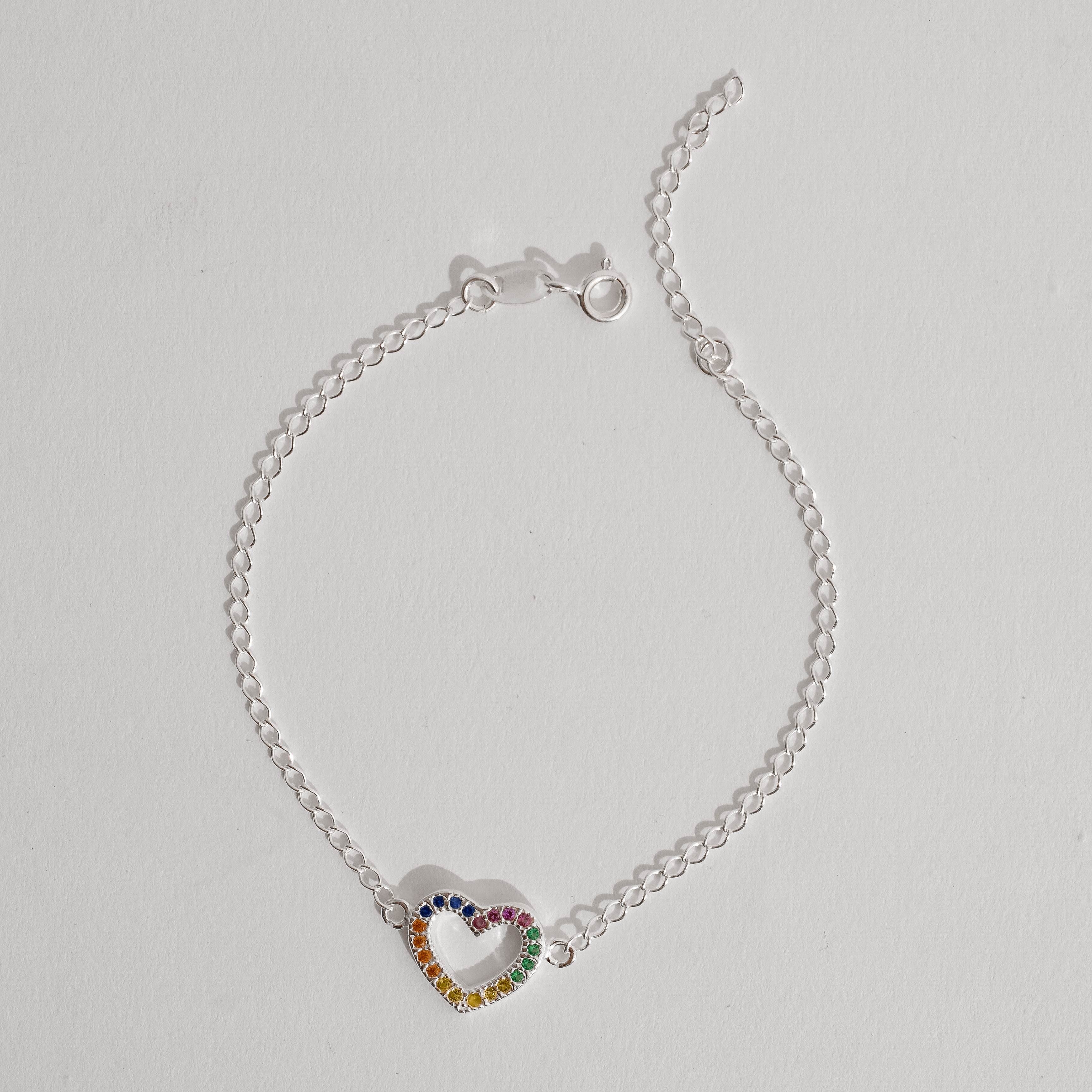 Imagem Pulseira entremeio coração vazado cravejado colorido 13mm