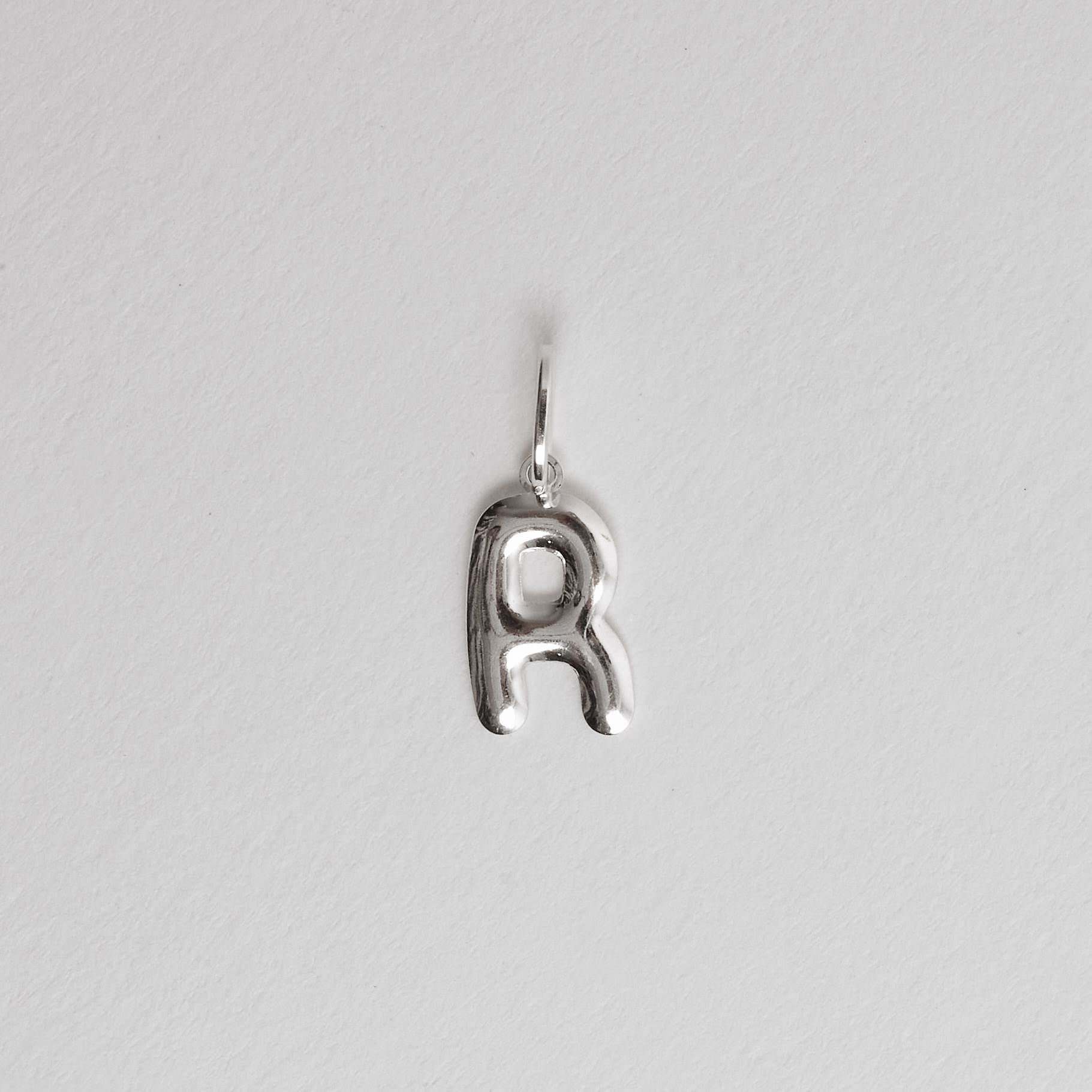 Imagem Secundária Pingente letra R 15mm