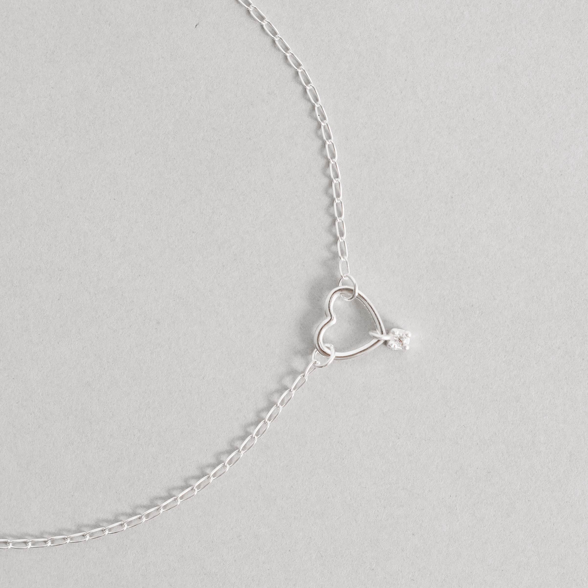 Imagem Secundária Pulseira entremeio coração vazado pingente mini zircônia