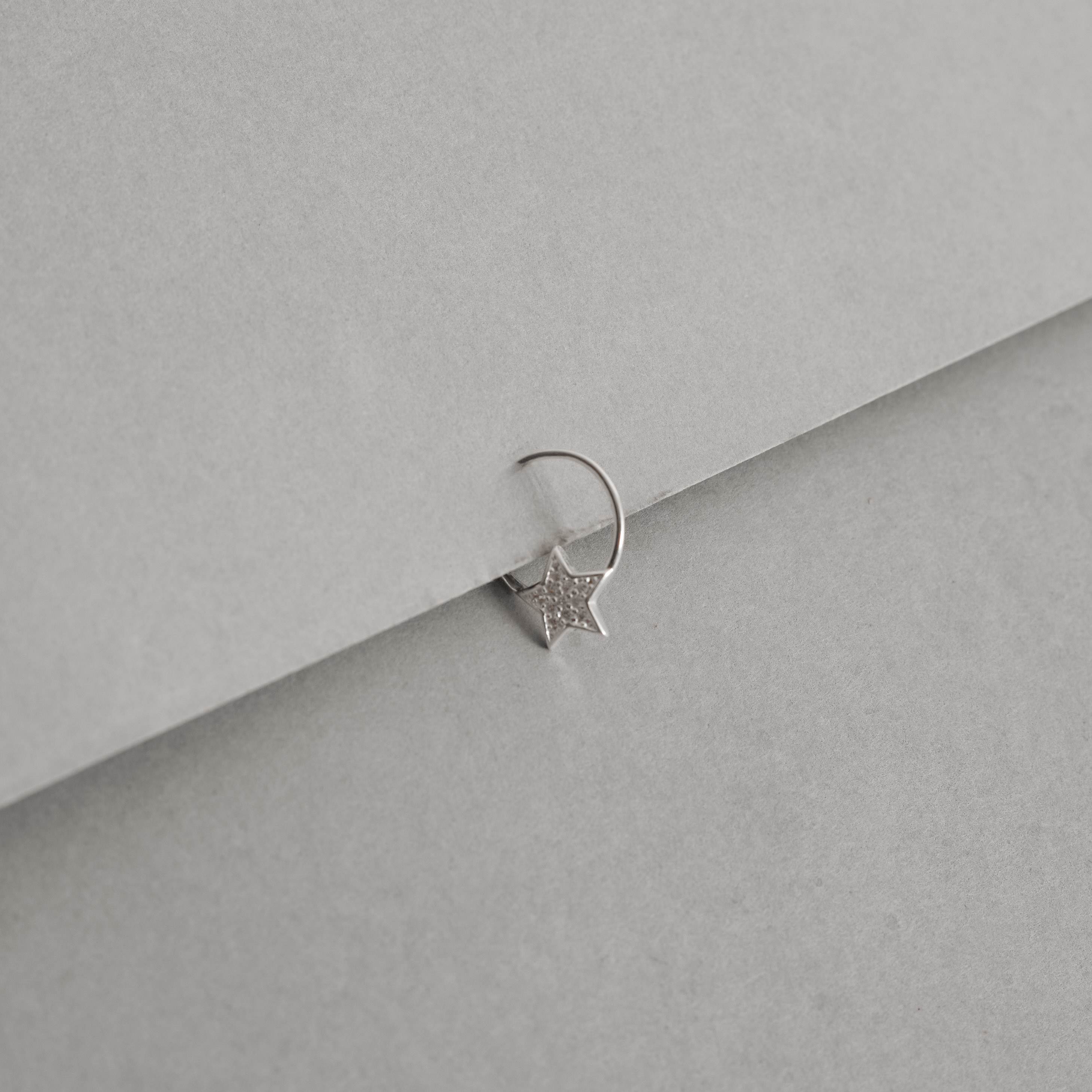 Imagem Secundária Piercing argola com estrela cravejada 11mm