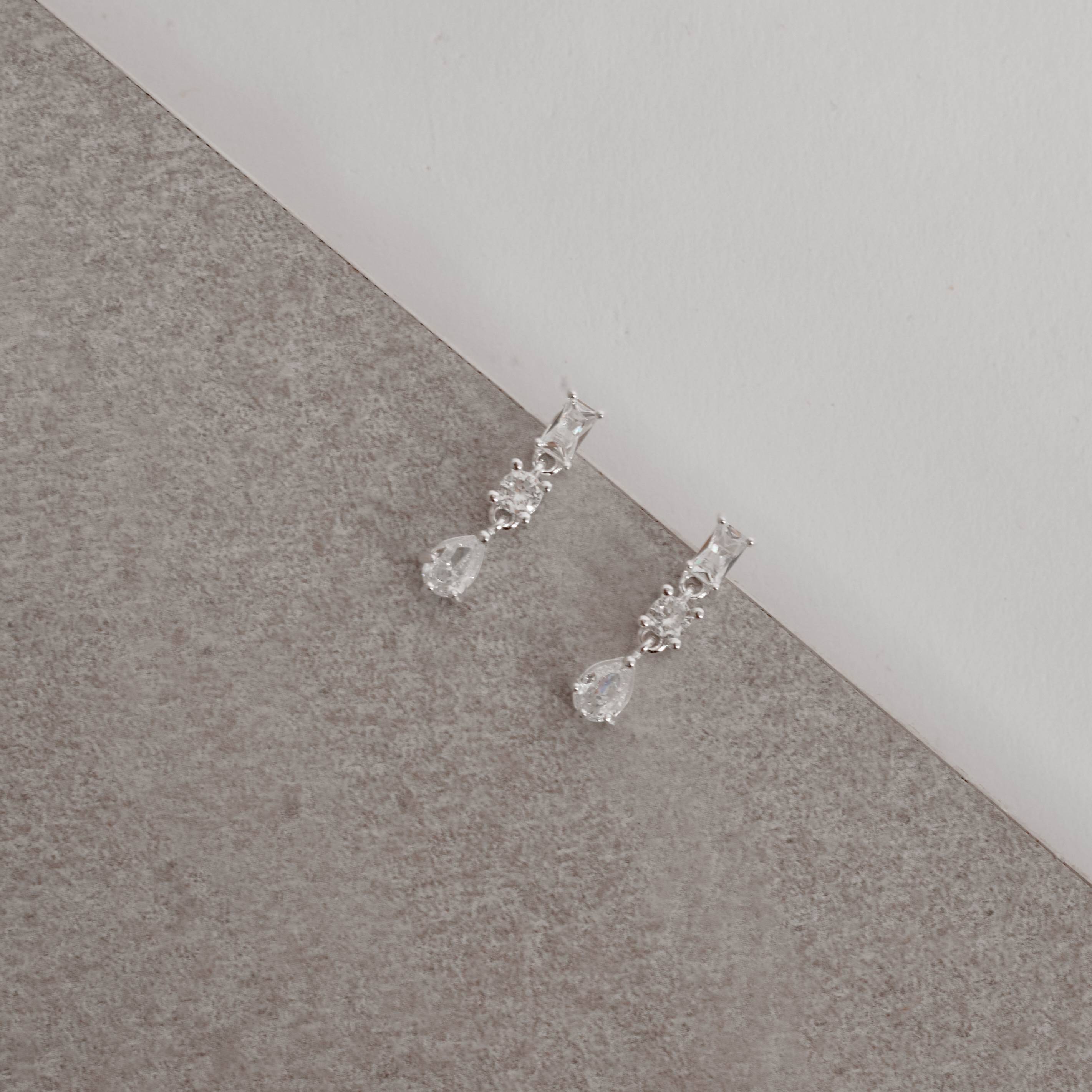 Imagem Brinco pingente zircônias 21mm