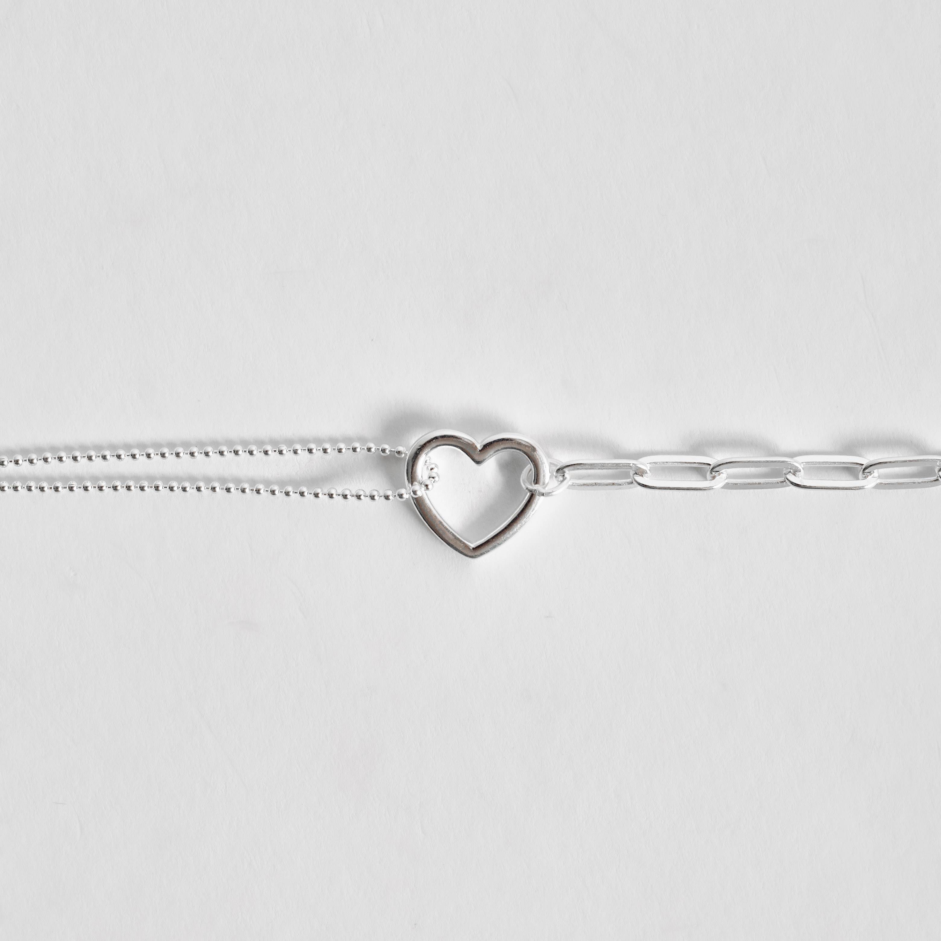 Imagem Pulseira entremeio coração vazado 14mm correntes bolinhas e cartier 15+5cm