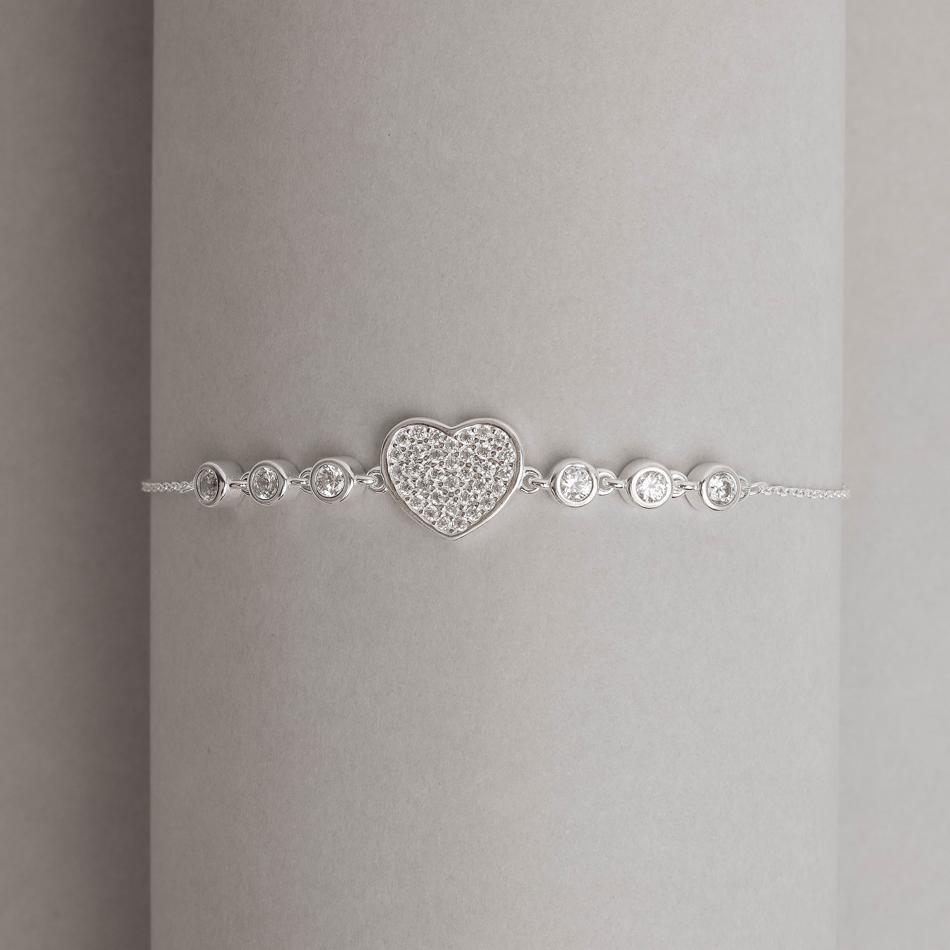 Imagem Secundária Pulseira entremeios coração cravejado e zircônias 16+4cm