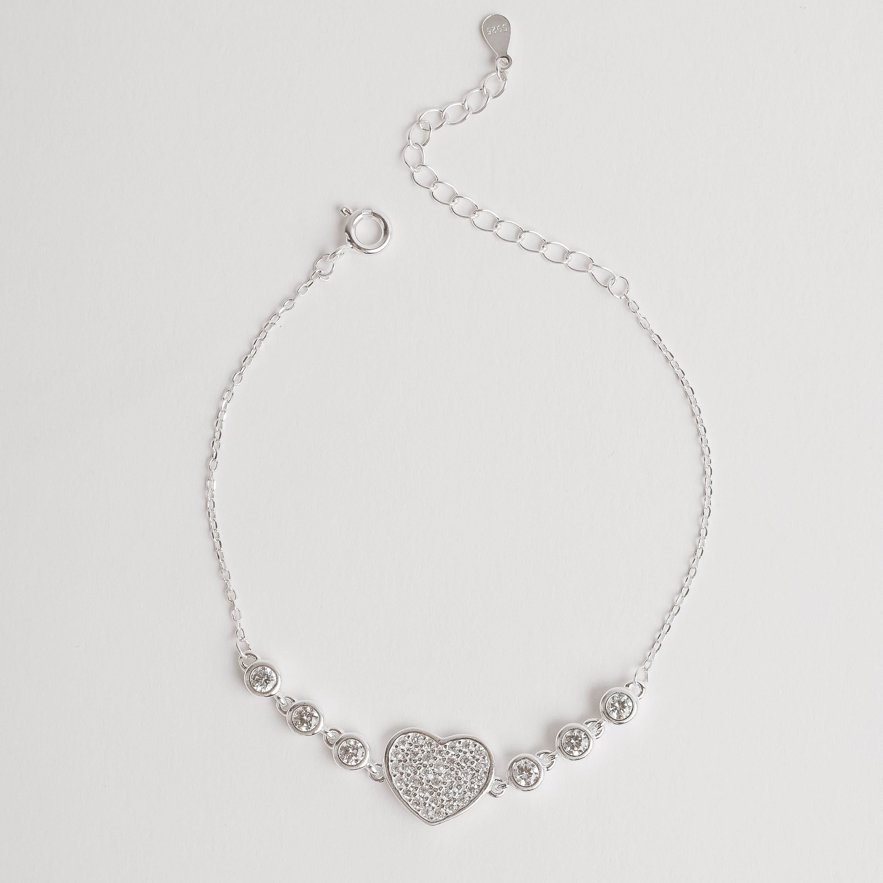 Imagem Pulseira entremeios coração cravejado e zircônias 16+4cm