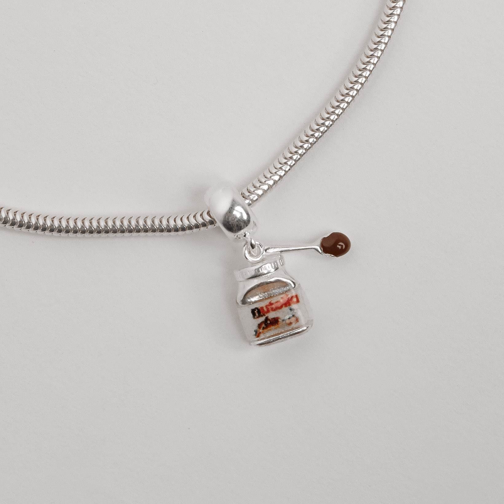 Imagem Secundária Berloque pingente Nutella 10mm resina