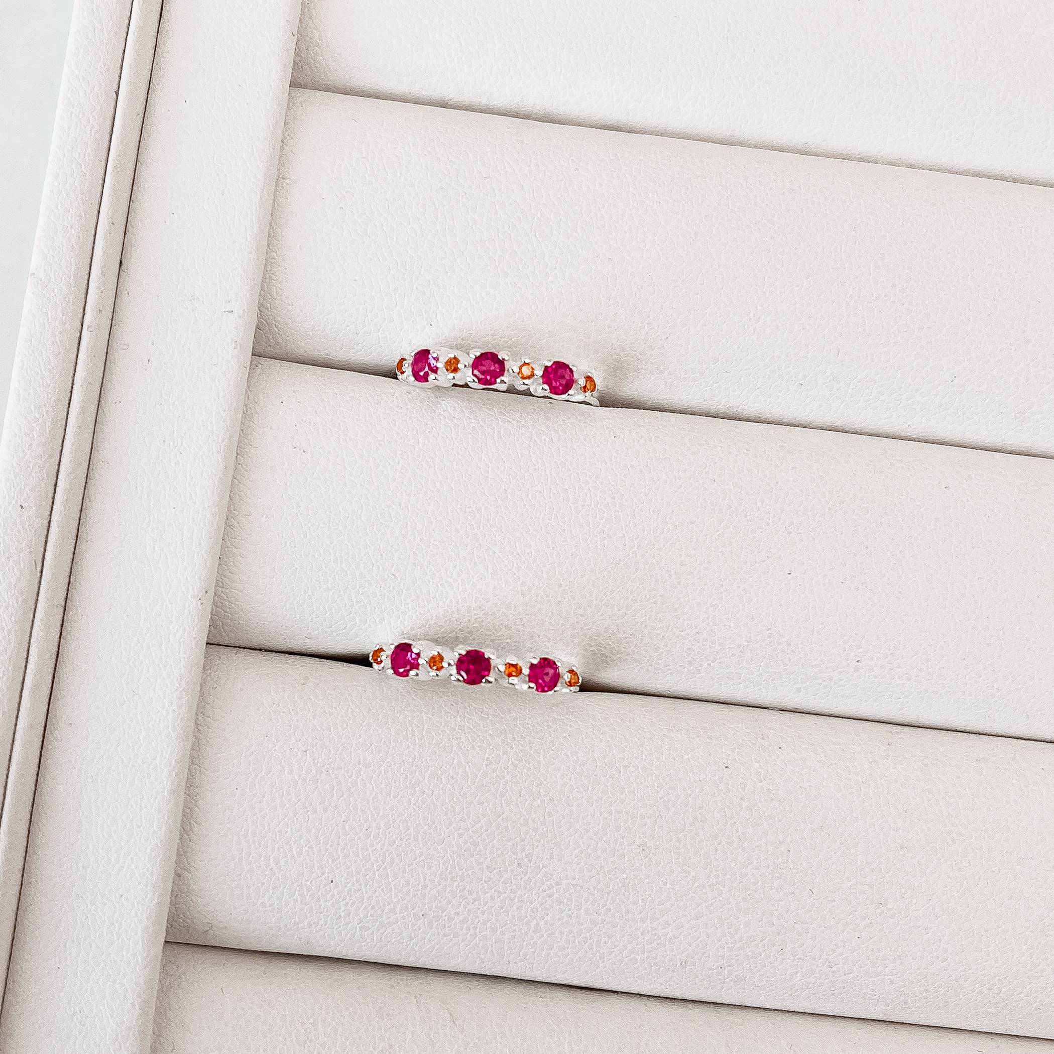 Anel zircônias redonda pink e laranja