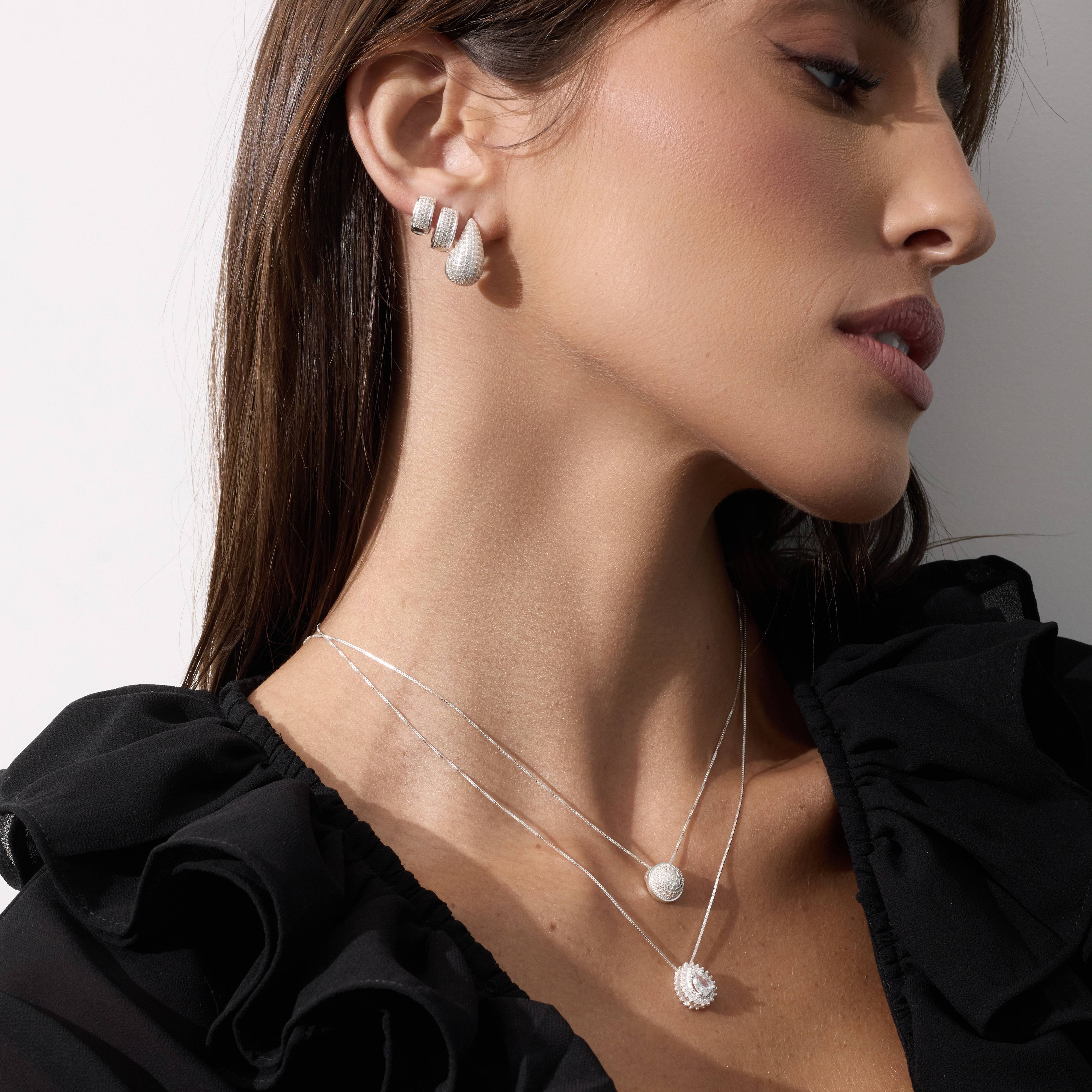 Imagem Secundária Brinco gota pesada cravejada 18mm